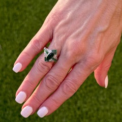 Mid-20th Century Emerald Diamond Platinum Vintage Cocktail Ring