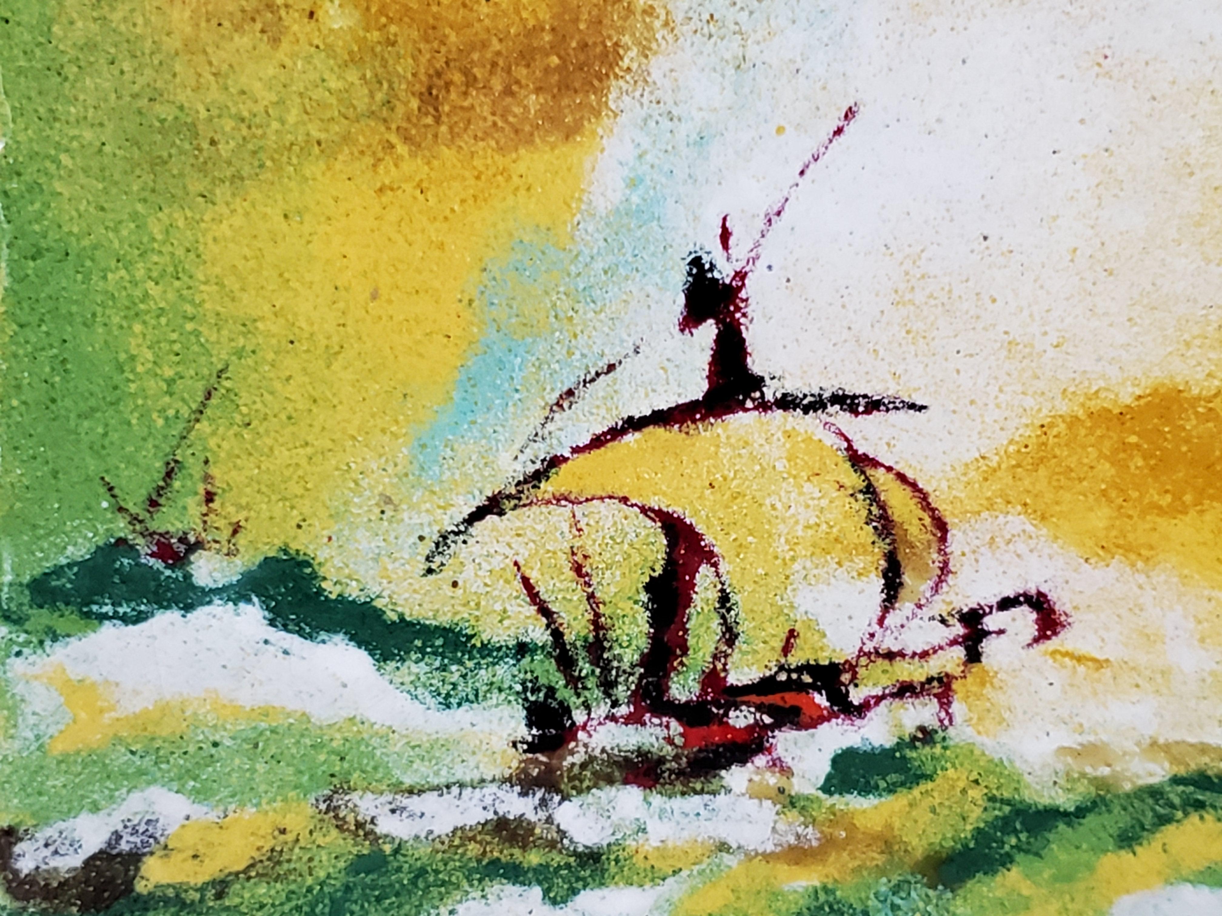 This unique and vibrant enamel painting on copper is of a sailboat in stormy waters. The sky is aglow in bright yellow, ochre, and white mixing with hints of blue and green. The rolling sea is of the same colours but is predominantly green and white