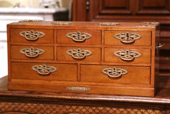 Mid-20th Century English Carved Mahogany and Brass Eight-Drawer Jewelry Box