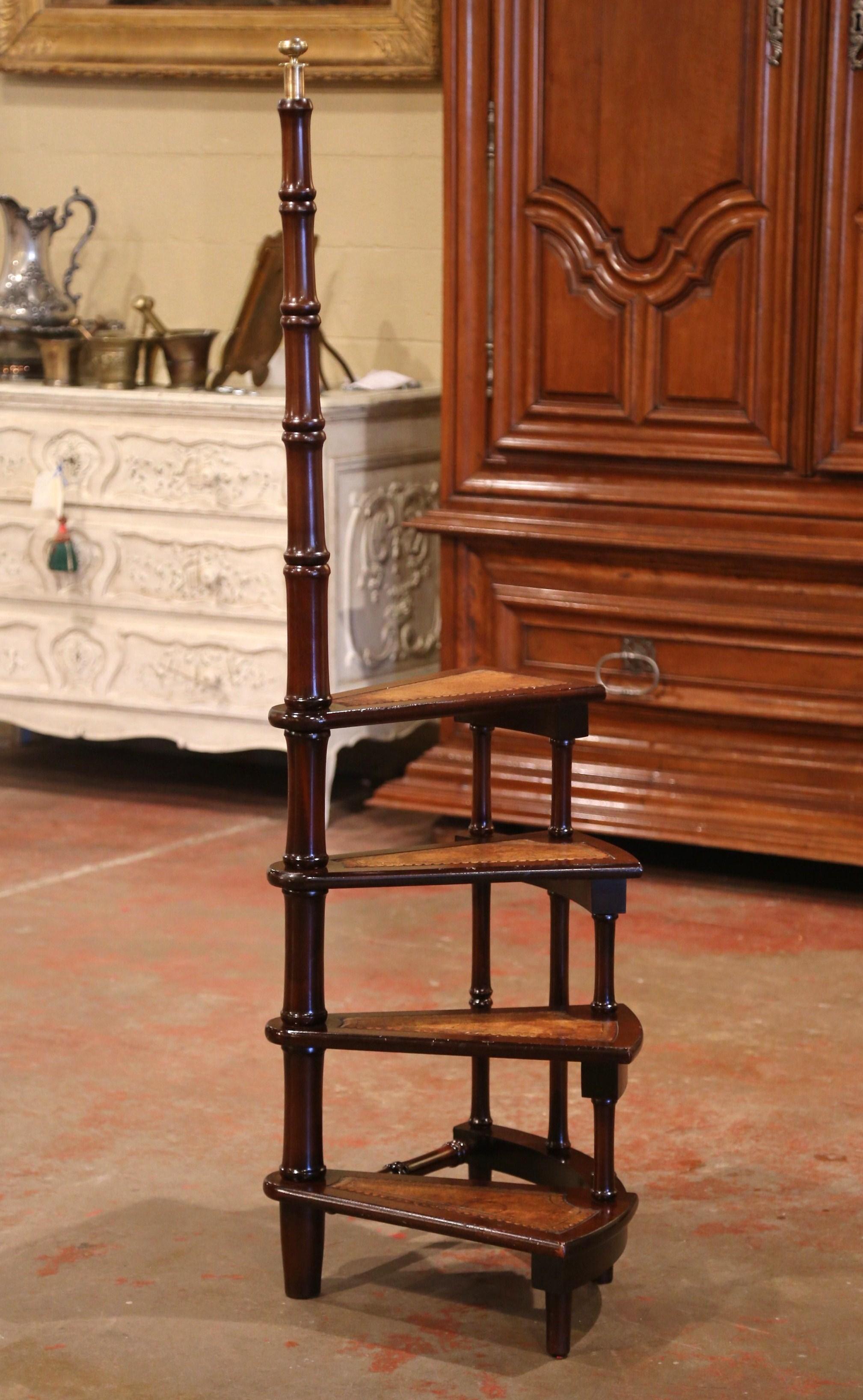 Patinated Mid-20th Century English Carved Mahogany and Leather Spiral Step Library Ladder