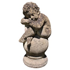 Mid-20th Century English Cast Stone Figure of a Sleeping Boy on a Ball