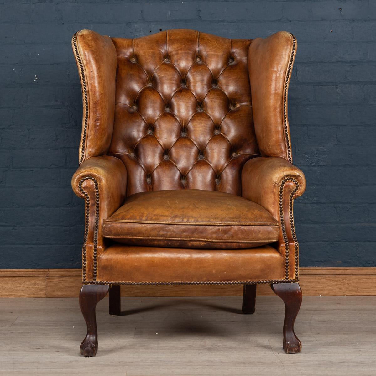 A lovely English wing back leather chair with button down backrest from the middle of the last century. Great patina and color.

Please note that our interior pieces are located at our Interior Design Showroom in Northamptonshire.
  