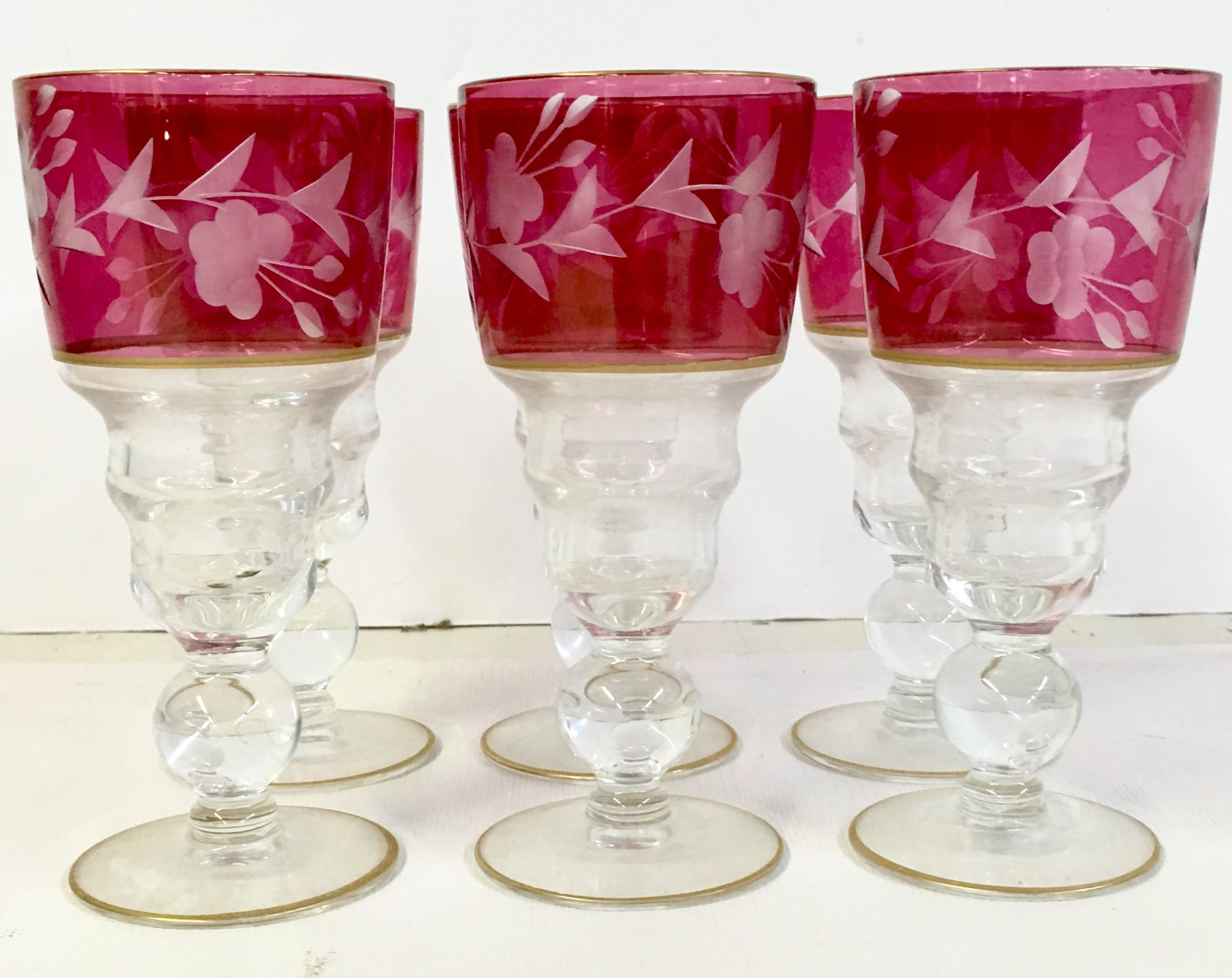 Mid-20th century etched crystal and 22-karat gold cordial drink glasses set of six pieces. Features a
floral vine motif with 22-karat gold cup and foot rim detail.