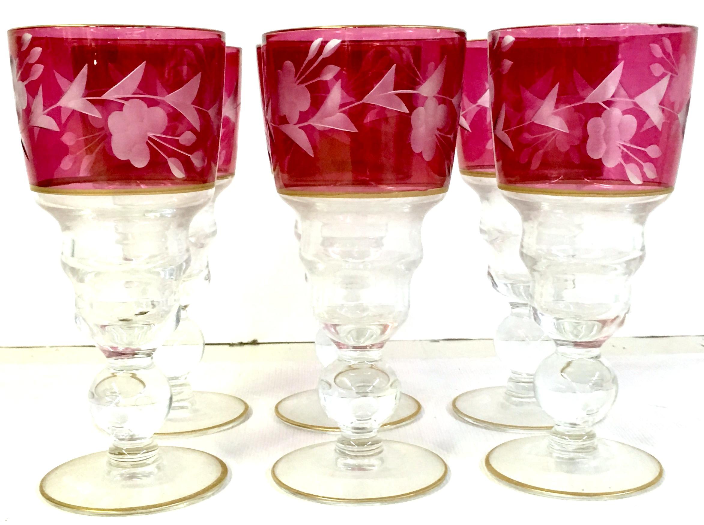Mid-20th Century etched crystal & 22k gold cordial drink glasses set of six pieces. Features a 
floral vine motif with 22-Karat gold cup and foot rim detail.