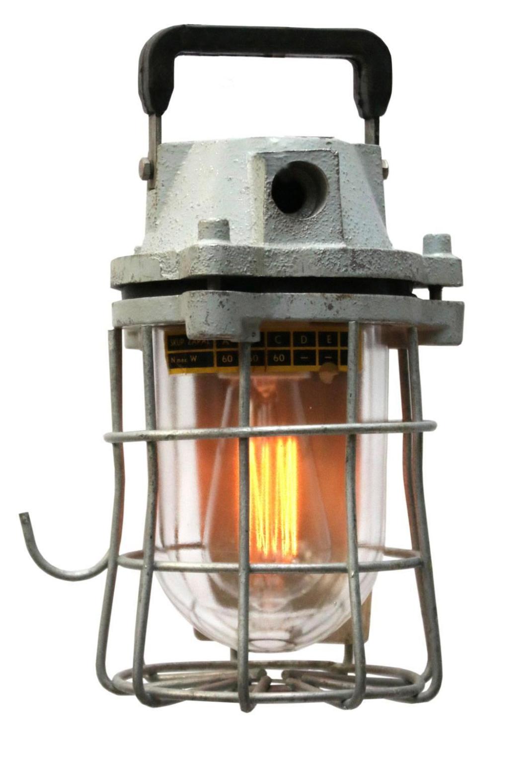Midcentury European industrial mining cage lighting.

Original good condition, great patina!

Weight 4.0 kg / 8.8 lb
Size: H 13.5 in. x Dm 7 in.

48 x on stock.
  