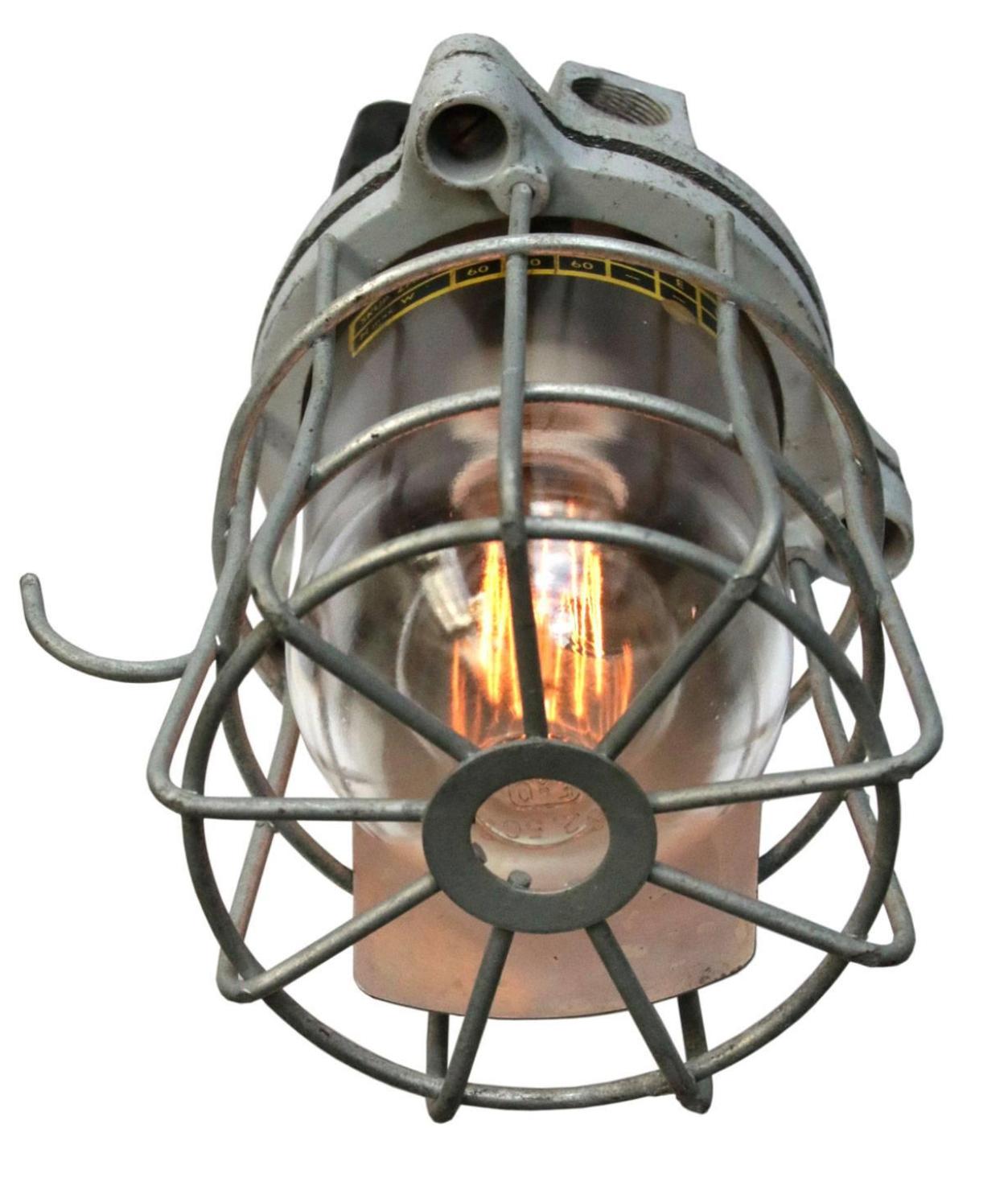 Midcentury European Industrial mining cage lighting.

Original good condition, great patina!

Weight 4.0 kg / 8.8 lb
Size: H 13.5 in. x Dm 7 in.

48 x on stock.
  