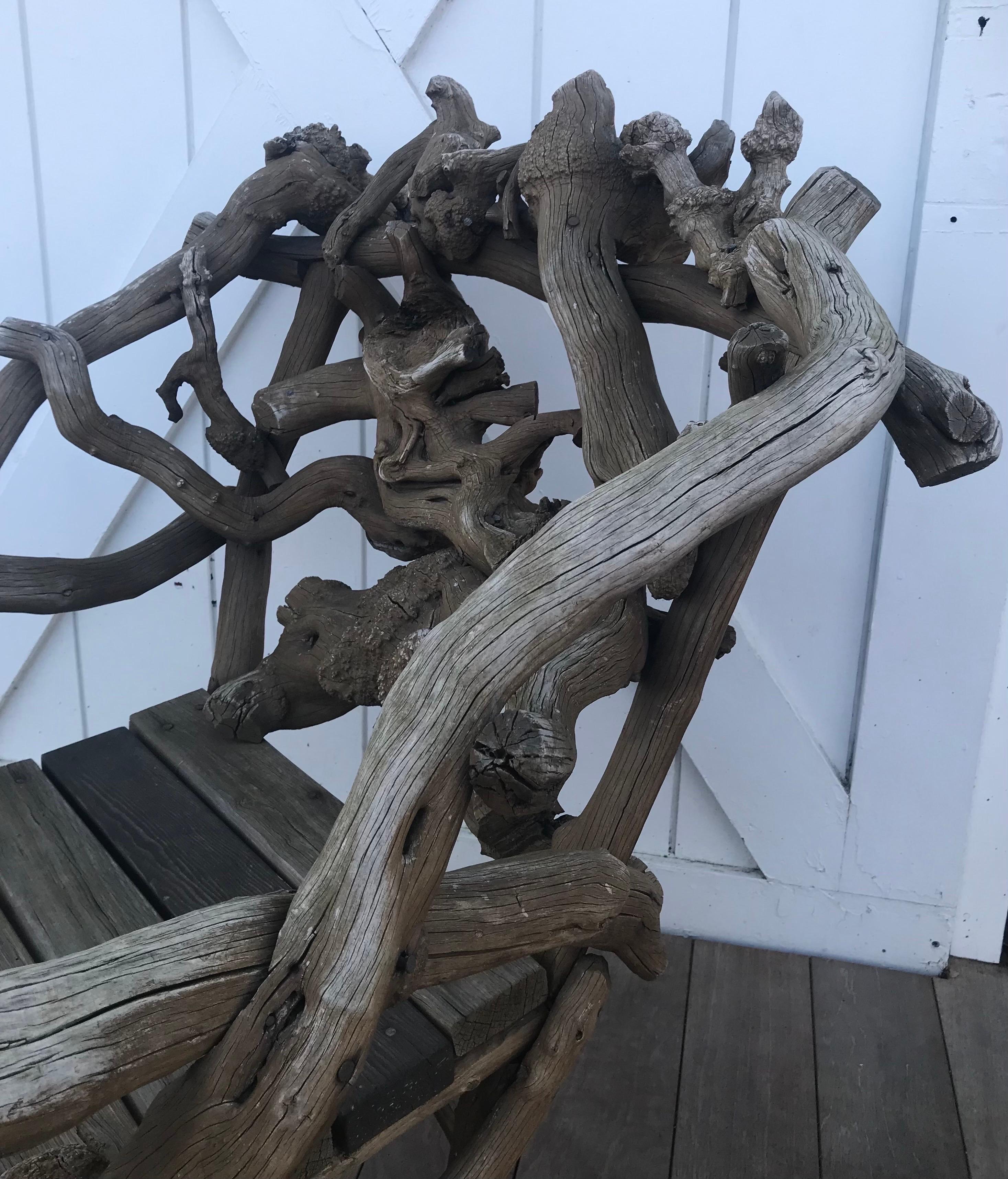 European (France) root chair fabricated of rhododendron vines. 
Very interesting look can be indoors or out. Looks great with a seat pad or interesting fur.
