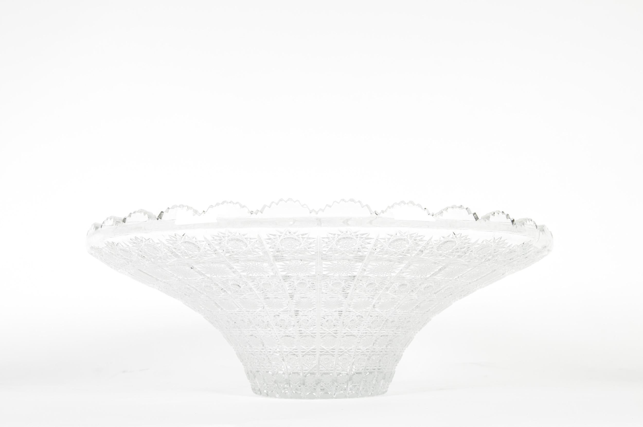 Mid-20th century exquisite cut crystal center piece bowl. The center piece is in excellent vintage condition. The piece measure about 16 inches diameter x 5 inches high. Base diameter is about 5 inches.