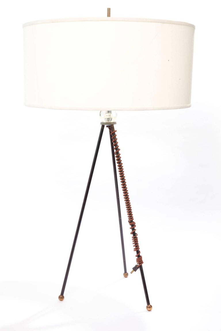 Mid-20th century extra tall iron table lamp with custom shade
Looks great on a low side table 

Dimensions: 46.75 in. to the top of the finial
 38.5 in H to socket; 43.5 in. to top of harp with finial 2.75 in. H
 Lamp shade is 12 in. H x 26.25