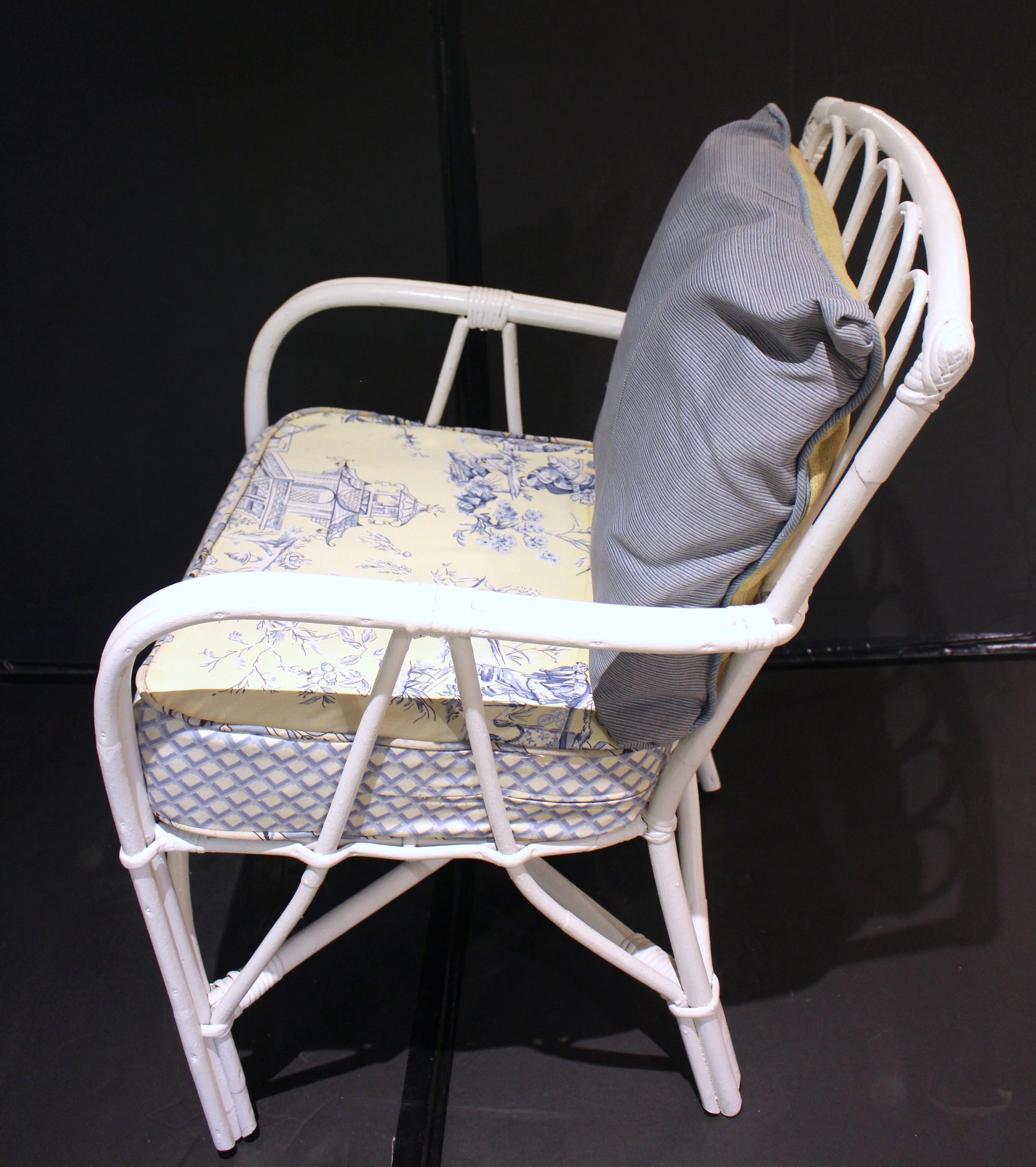 Mid-20th century Ficks Reed rattan arm chair. Elegant design; repainted with custom toile seat cushion (used condition). Includes back cushion. 18.5