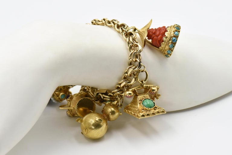 Mid-20th Century Figural Yellow Gold and Gemstone Charm Bracelet at 1stDibs