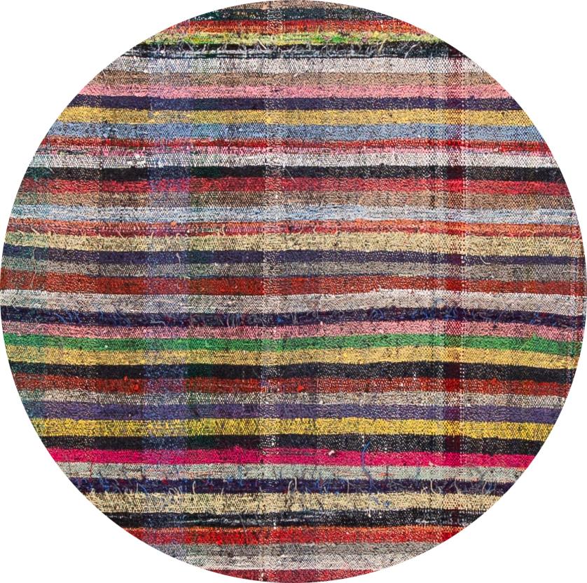 A beautiful mid-20th century flat-weave runner with an all-over multi-color motif. This piece has fine details, great colors and a beautiful stripe design. It would be the perfect addition to your home.
This rug measures 3'1