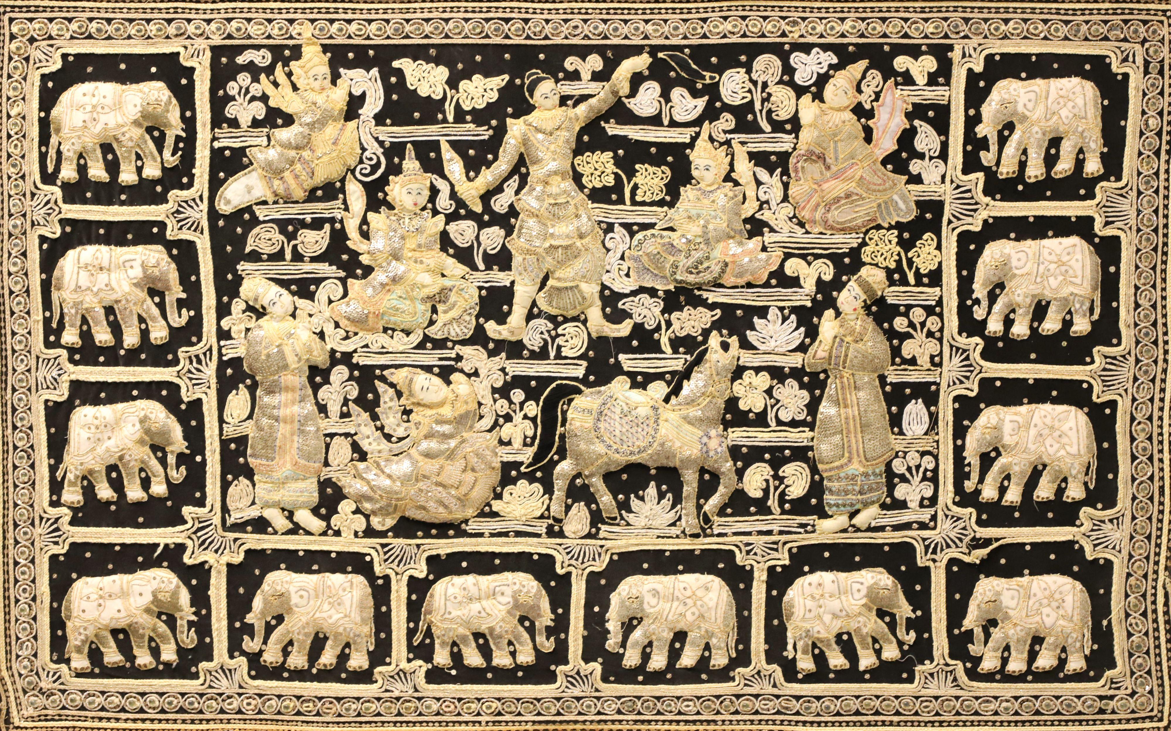 An original Burmese Kalaga style tapestry, from the mid 20th Century. Untitled, (People with Horses & Elephants). Unsigned, artist unknown. Heavily embroidered appliqué tapestry of silk, wool, lace and beading against a background made of cotton.