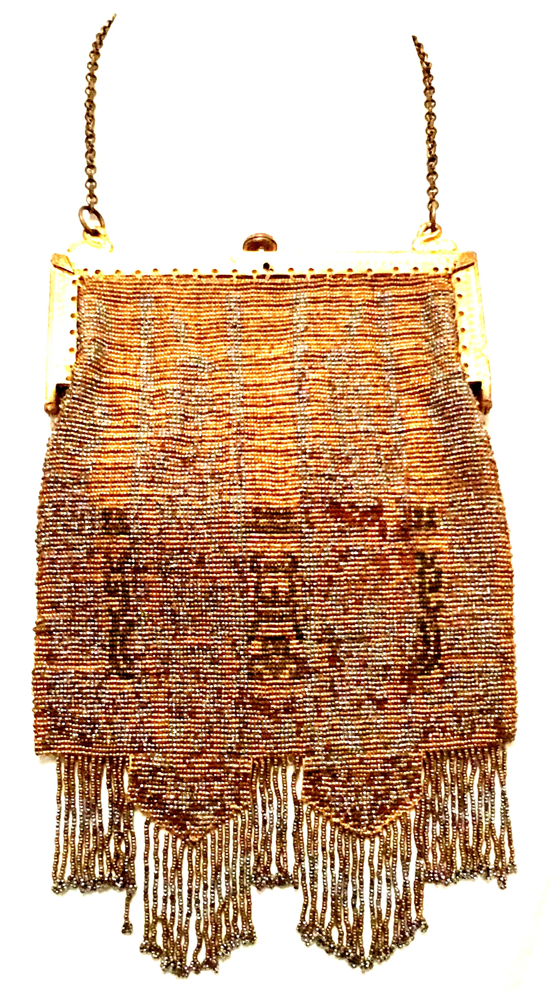 Mid- 20th Century French Art Deco Cut Steel Micro Beaded Gold Plate Frame Evening Bag. This incredibly rare and well persevered hand made evening bag features metallic cut and faceted micro steel beads in gold to copper ground with silver to gun