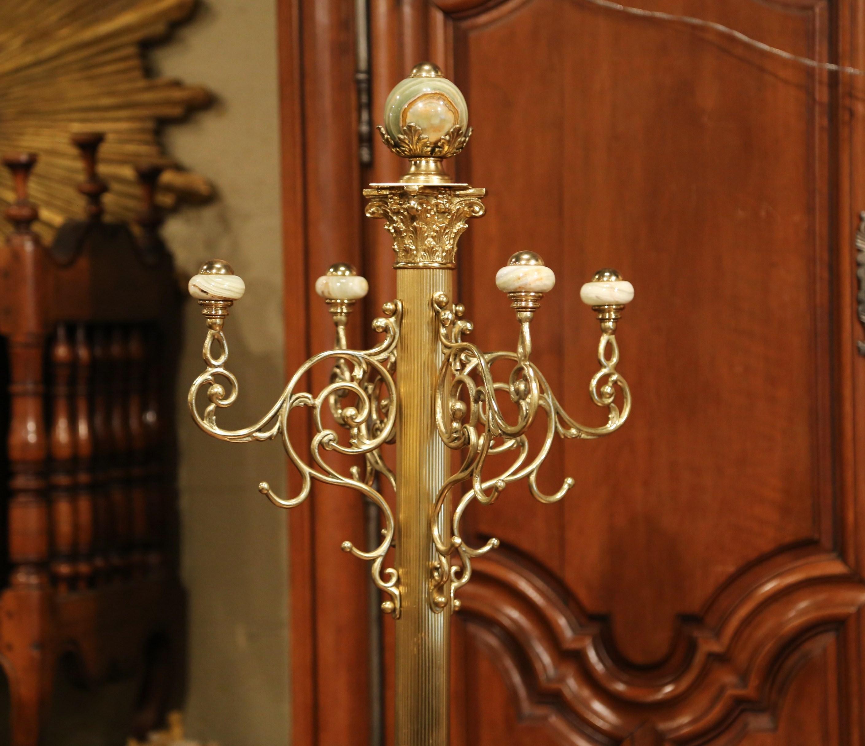 Add a touch of old French style to your home with this vintage, free standing coat rack and hat rack. This brass and marble stand was created in France, circa 1960, and would be the perfect piece to hold your clothing and accessories in the entryway