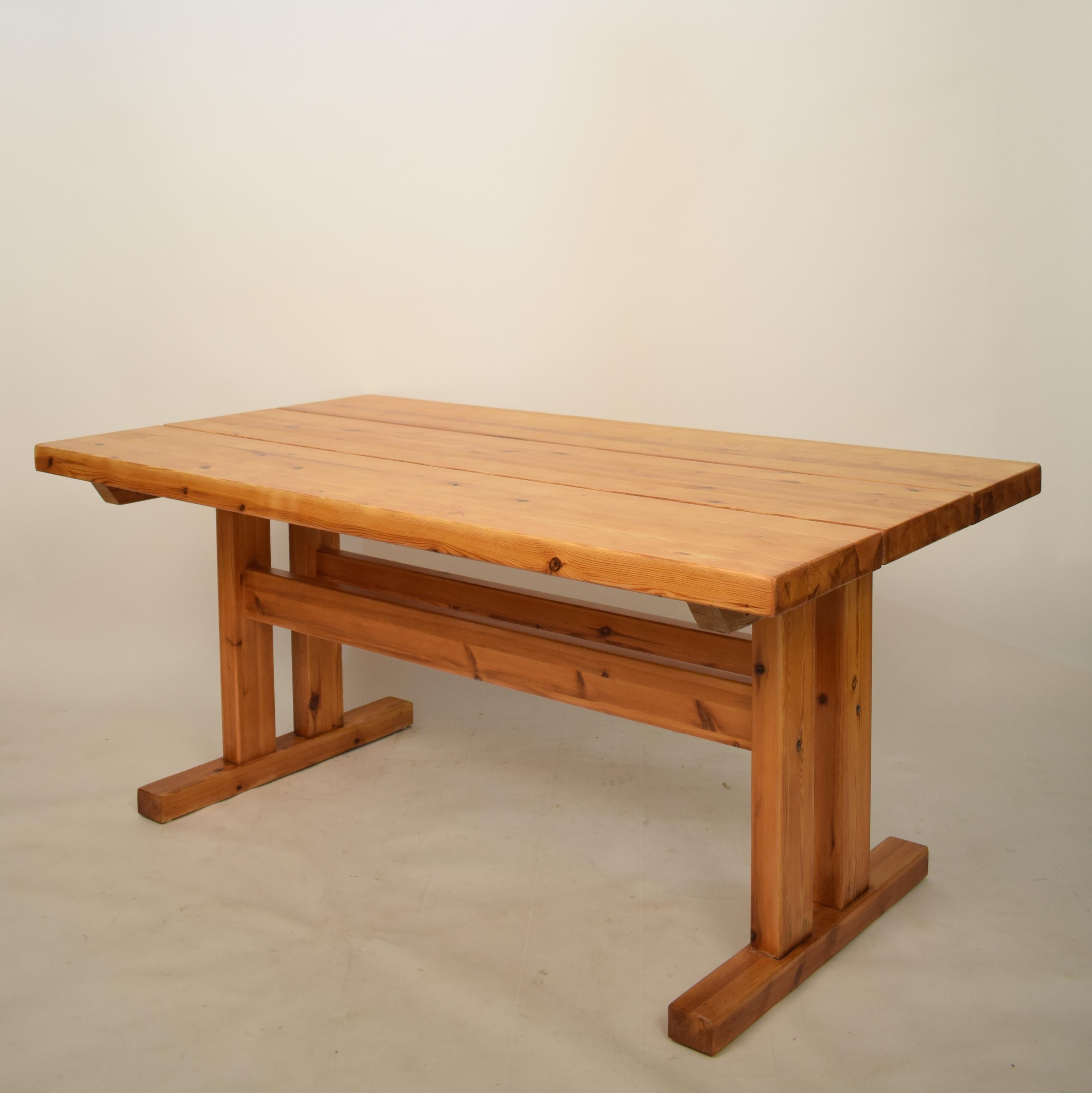 This mid-20th century french Brutalist trestle dining table or kitchen table was made in the 1970s. It is made out of solid pine.
A unique piece which is a great eye-catcher for your antique, modern, Space Age or midcentury interior.



  