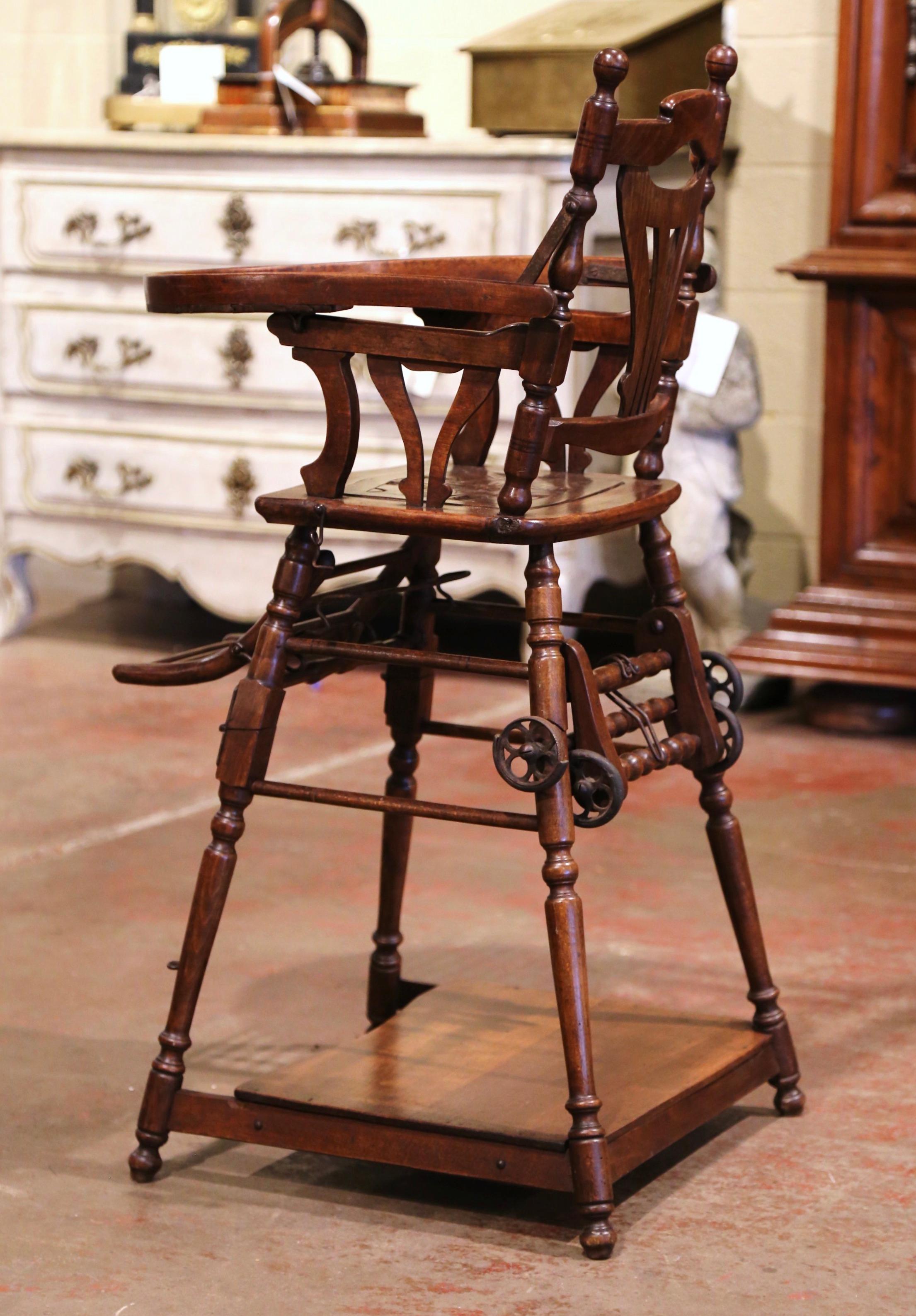 Mid-20th Century French Carved Folding Up and Down Child High Chair on Wheels 2