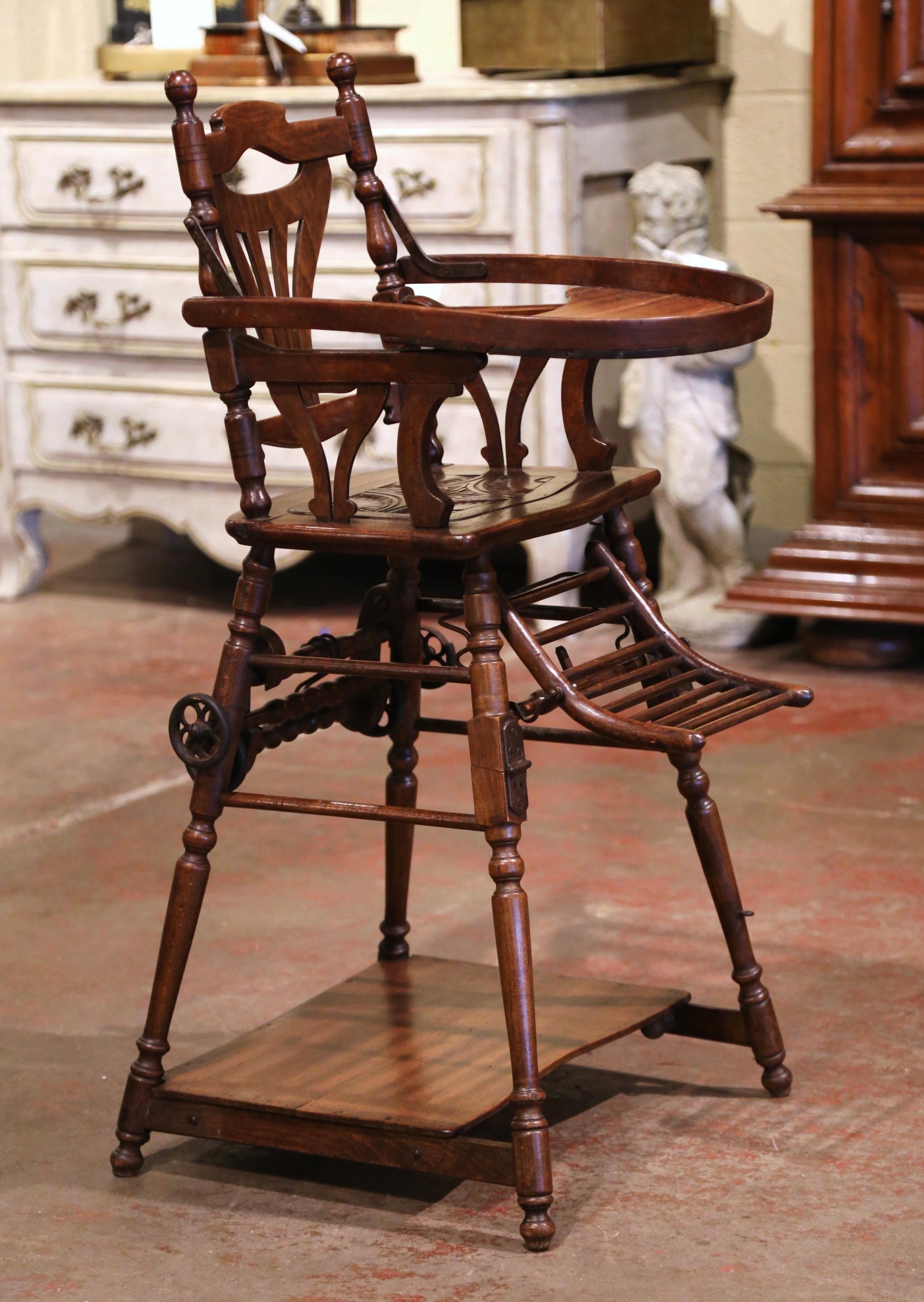 Oak Mid-20th Century French Carved Folding Up and Down Child High Chair on Wheels