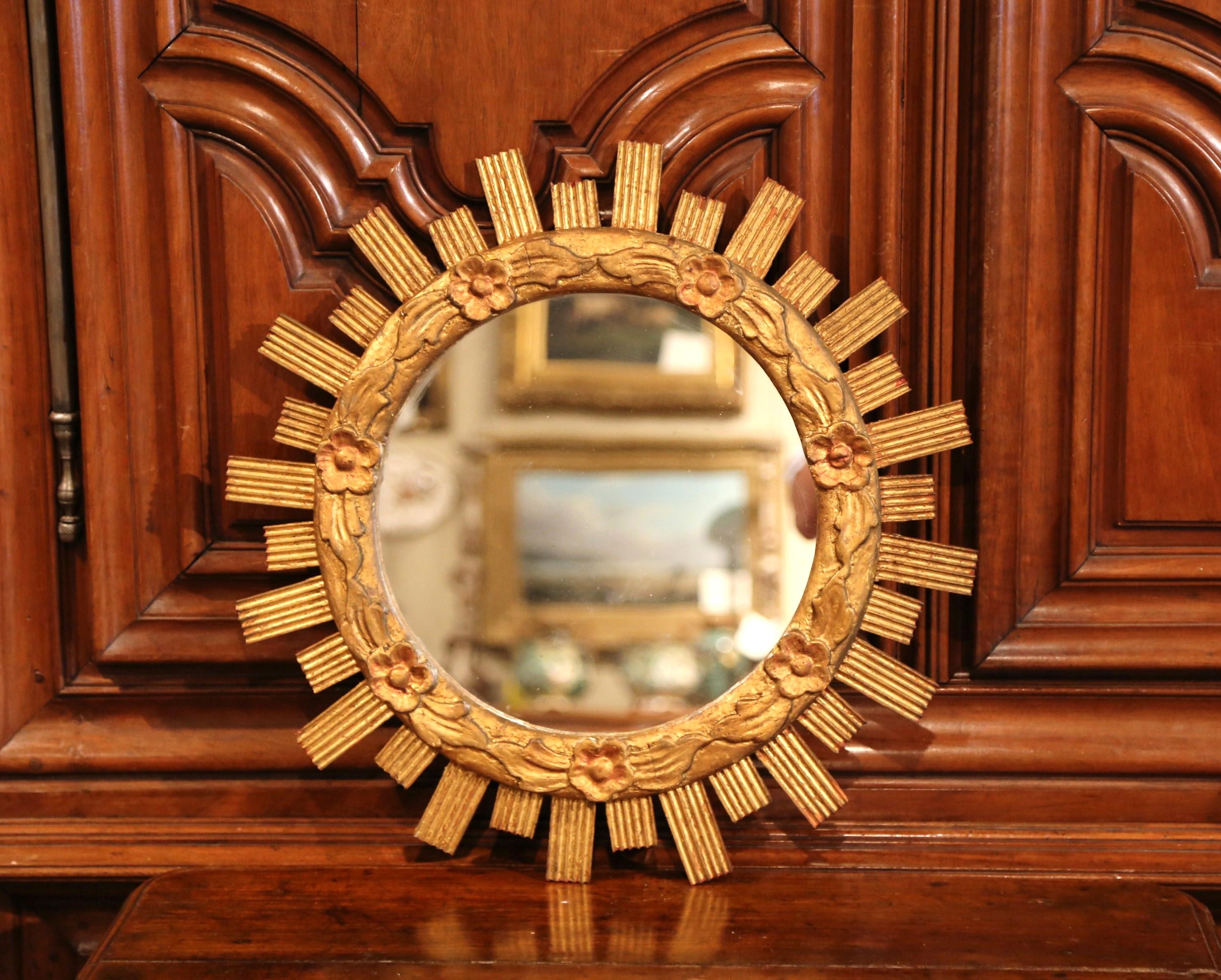 Mid-20th Century French Carved Giltwood Sunburst Mirror with Floral Decor In Excellent Condition In Dallas, TX