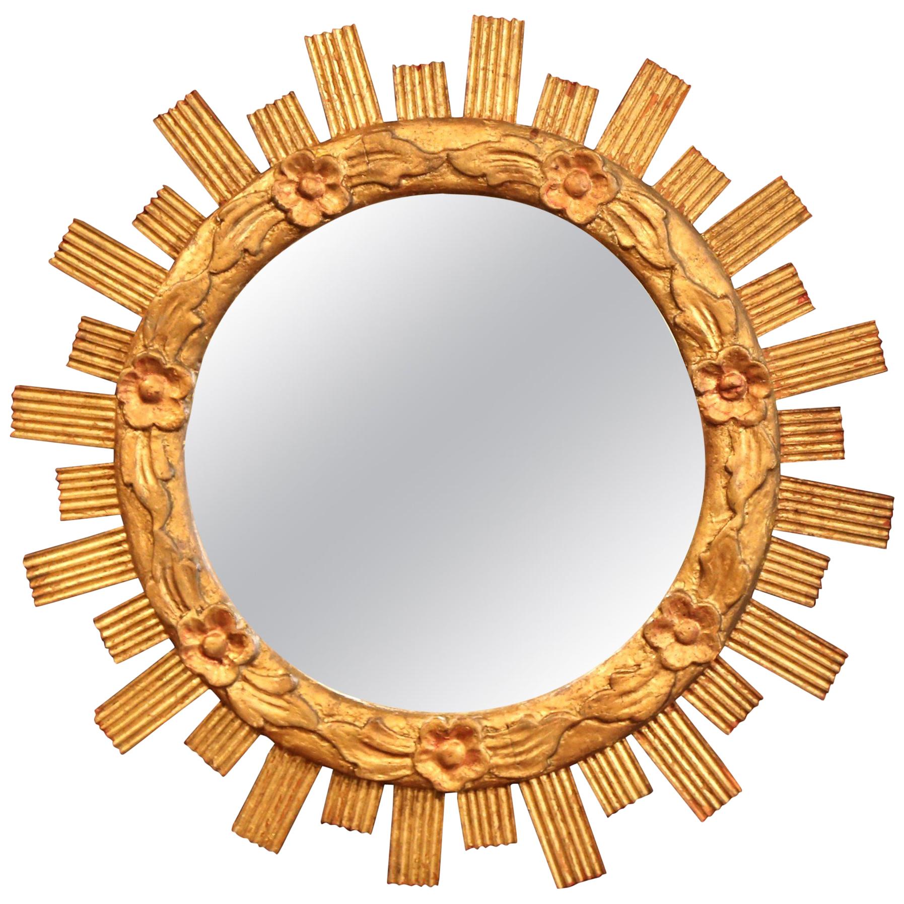 Mid-20th Century French Carved Giltwood Sunburst Mirror with Floral Decor