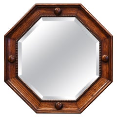 Mid-20th Century French Carved Oak Octagonal Wall Mirror with Beveled Glass