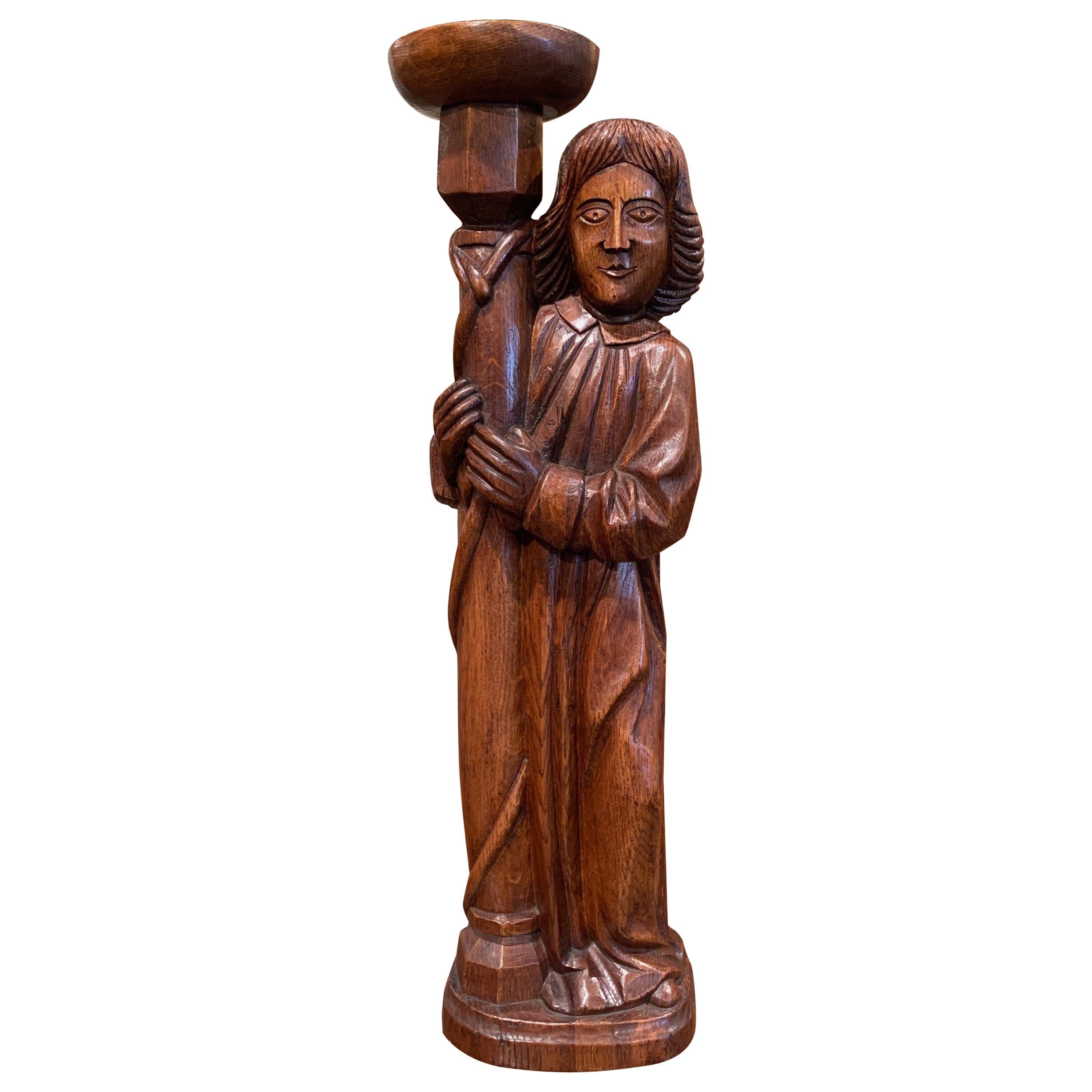 Mid-20th Century French Carved Oak Statuary Candleholder For Sale