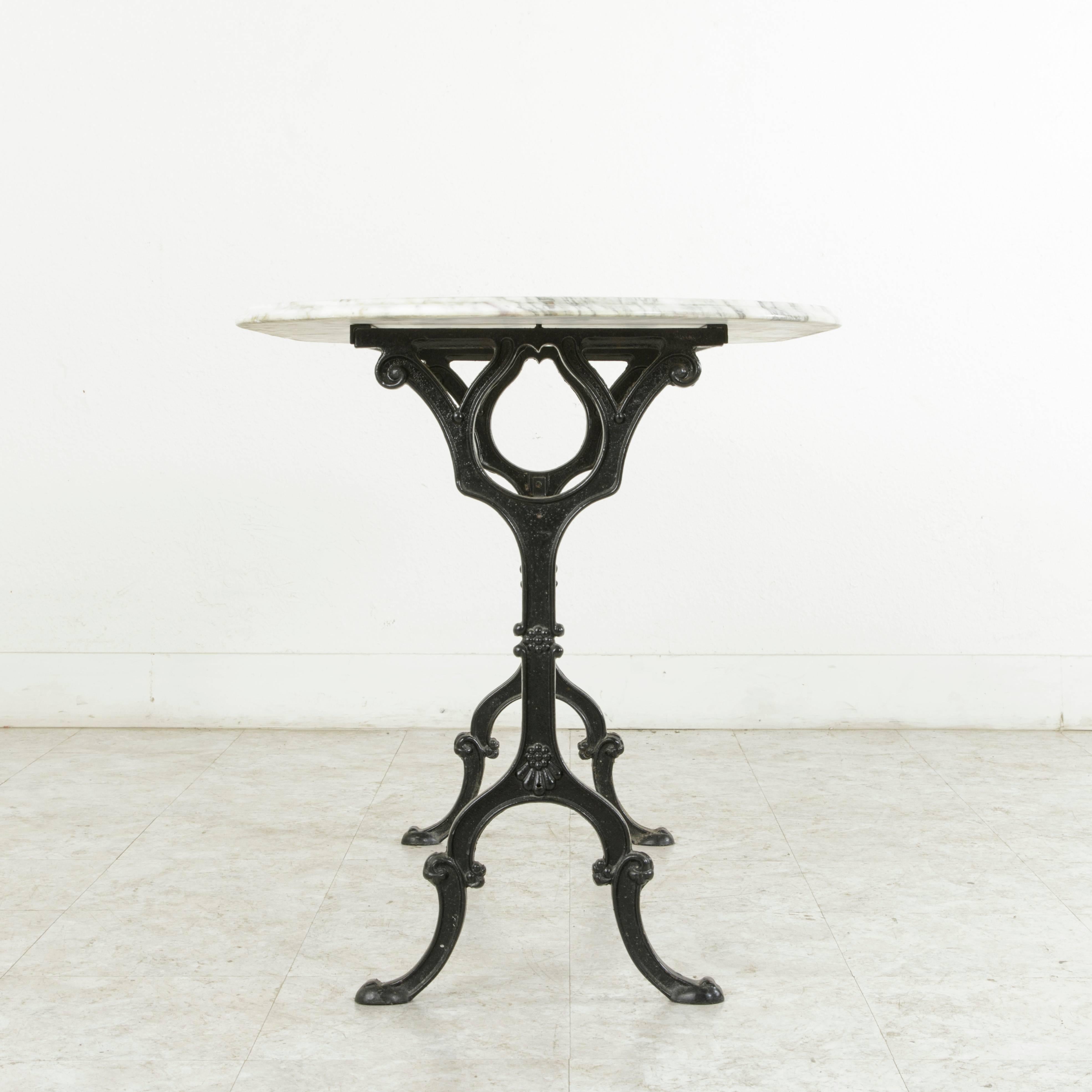 Mid-20th Century French Cast Iron Bistro Table with Bevelled Oval Marble Top In Excellent Condition In Fayetteville, AR