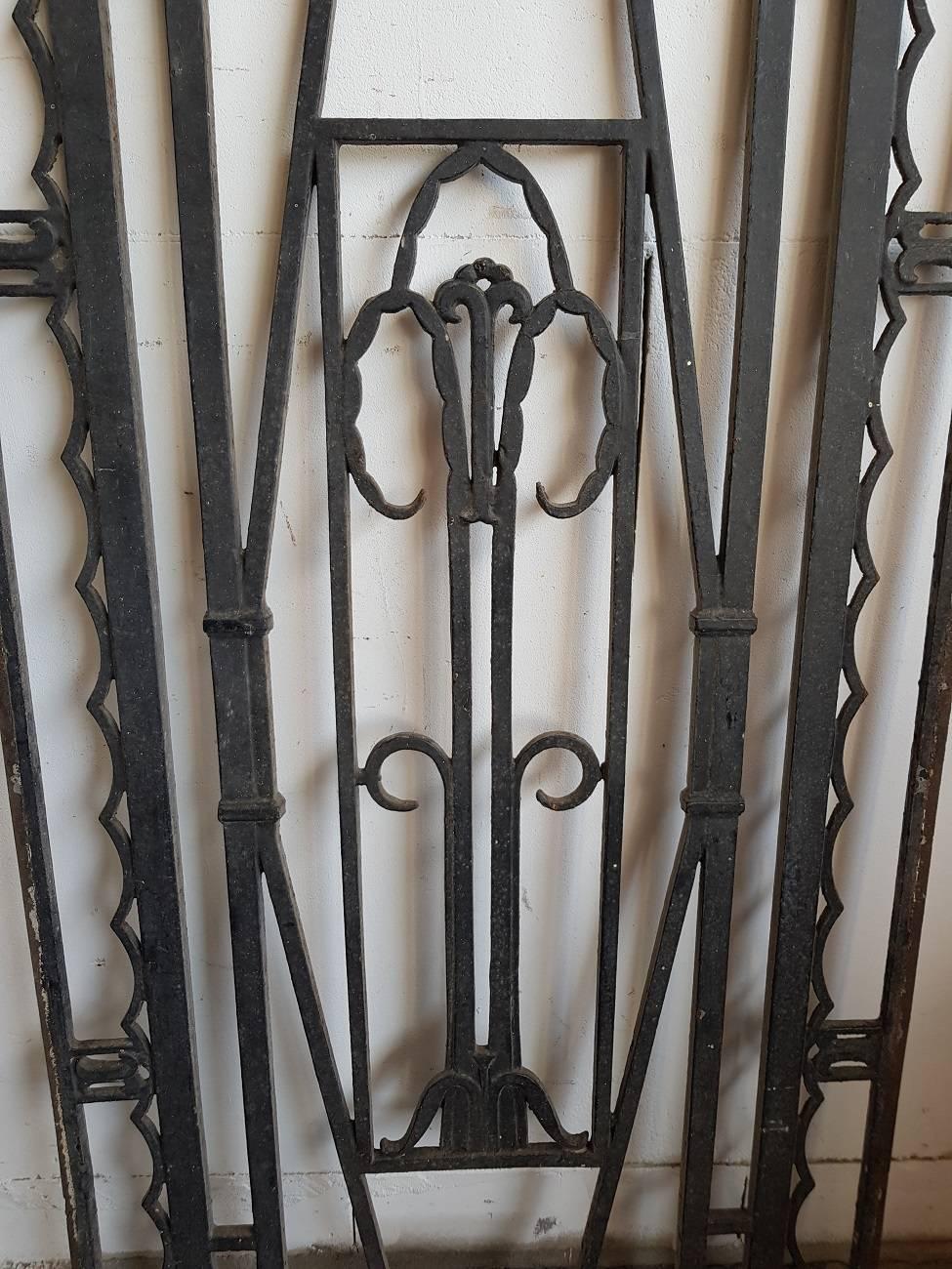 Sleek and Minimalist design French cast-iron door grill from the mid-20th century.

The measurements are,
Depth 1.3 cm/ 0.5 inch.
Width 55 cm/ 21.6 inch.
Height 100 cm/ 39.3 inch.
 