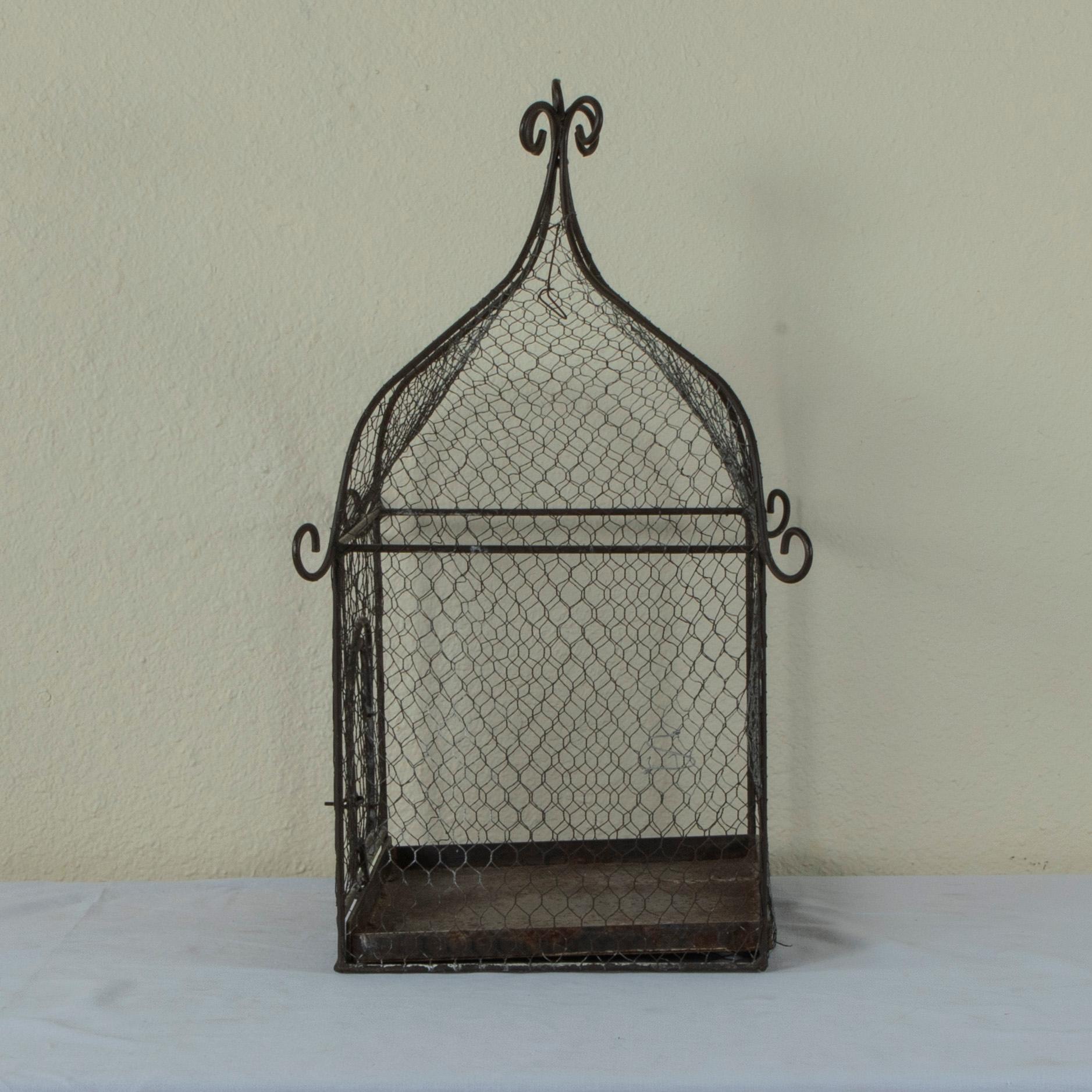 Mid-20th Century French Iron and Wire Bird Cage with Pullout Tray In Good Condition For Sale In Fayetteville, AR