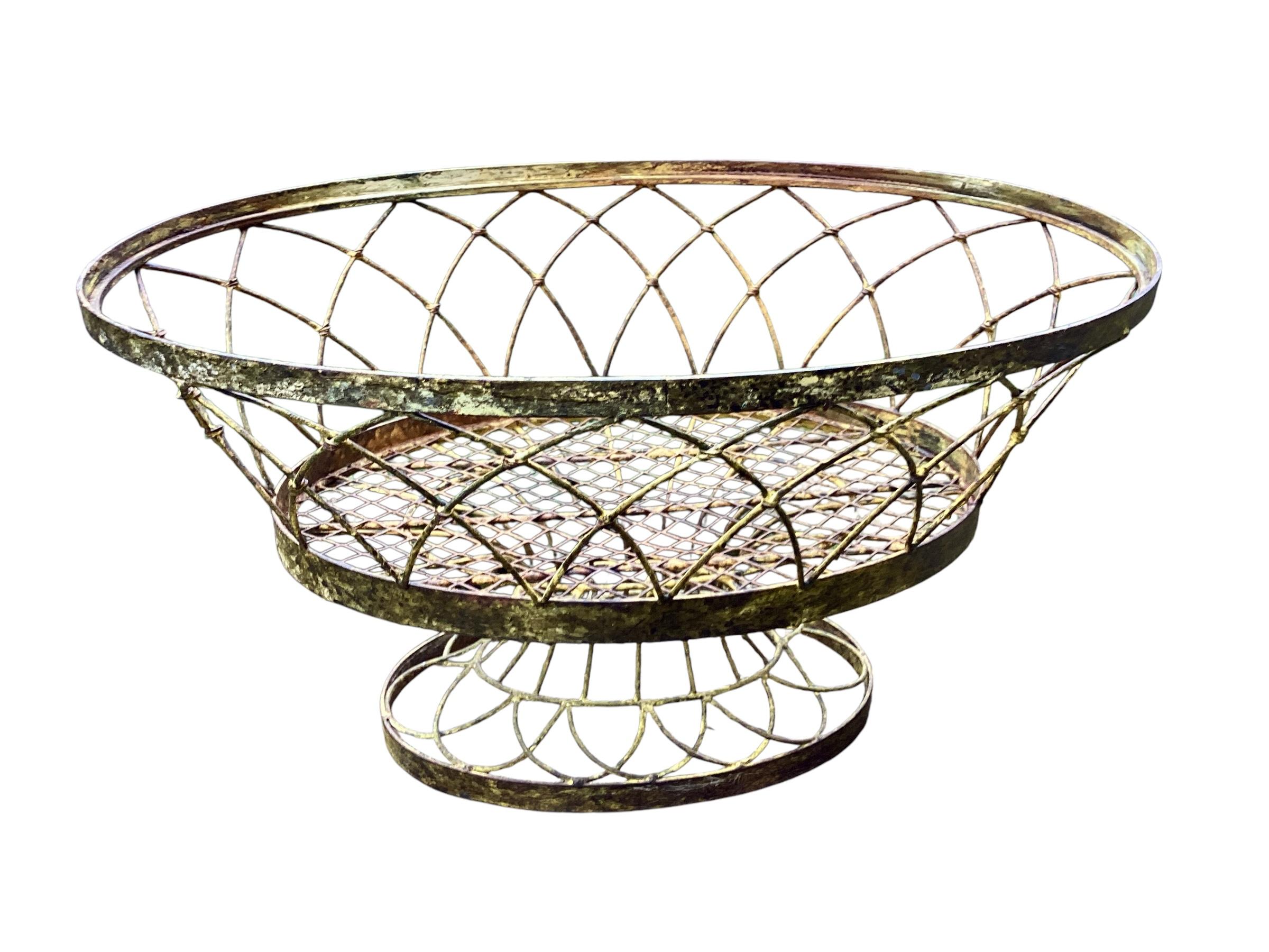 French iron wire garden plant pot holder stand jardiniere. This will work for indoor or outdoor use. Sturdy construction makes this a perfect holder for plants or Italian stone fruits.