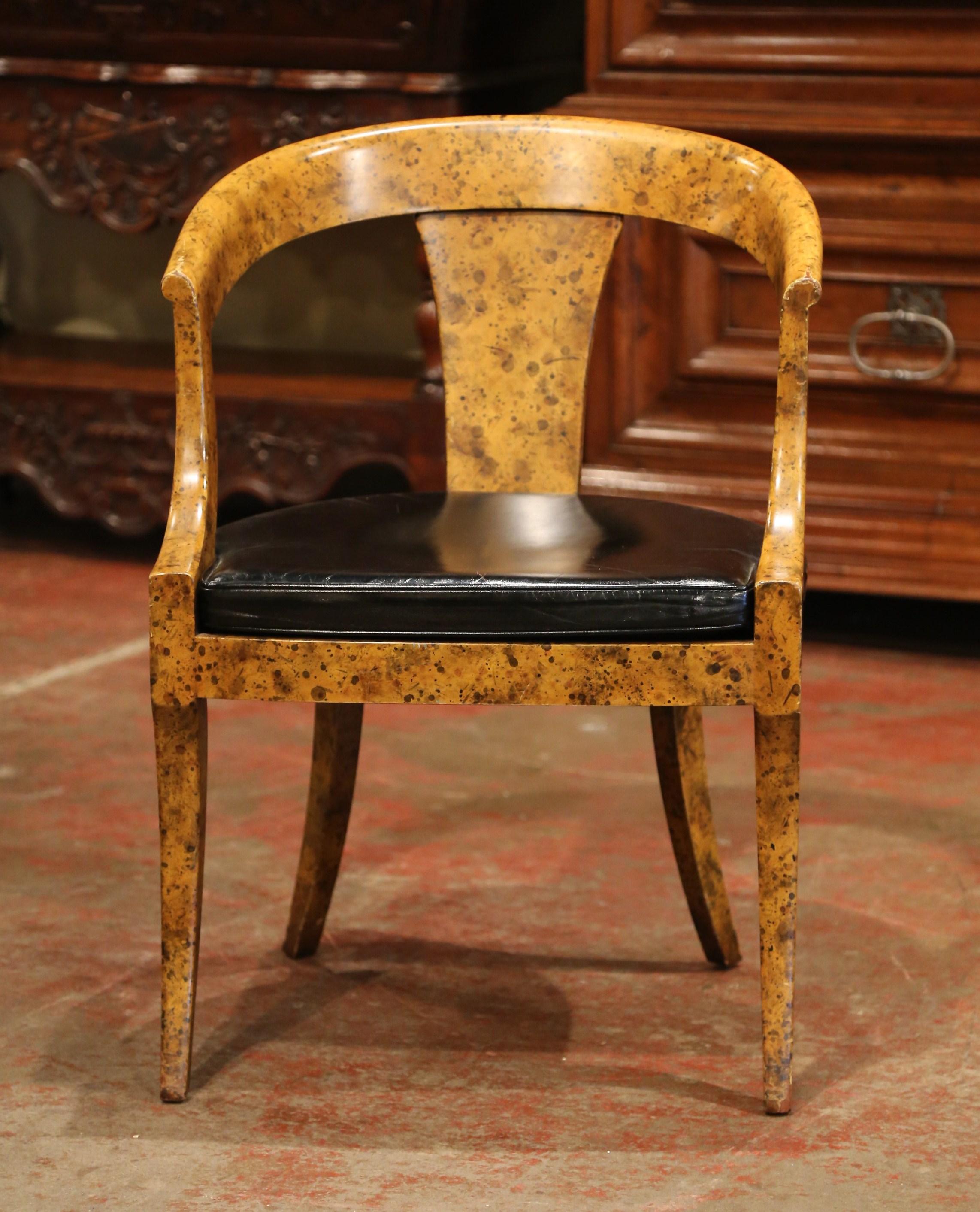 This mid-20th century Louis Philippe chair has a vintage shape and style that is highly compatible with current interior design trends. The sophisticated armchair would make an elegant yet subtle statement behind a man's desk. Crafted in France,