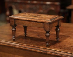 Mid-20th Century French Louis XIII Carved Oak Footstool with Stretcher