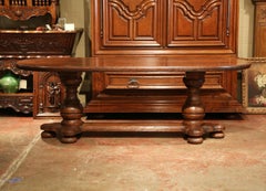 Mid-20th Century French Louis XIII Carved Oak Oval Farm Table with Stretcher
