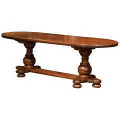 Mid-20th Century French Louis XIII Carved Oak Oval Farm Table with Stretcher