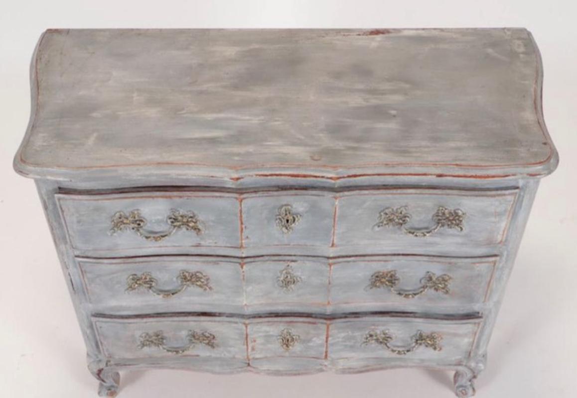 Mid-20th century French Louis XV style blue painted dresser
Made circa 1940. Three drawers. Lovely distressed blue painted finish.
Dresser measures 31.5