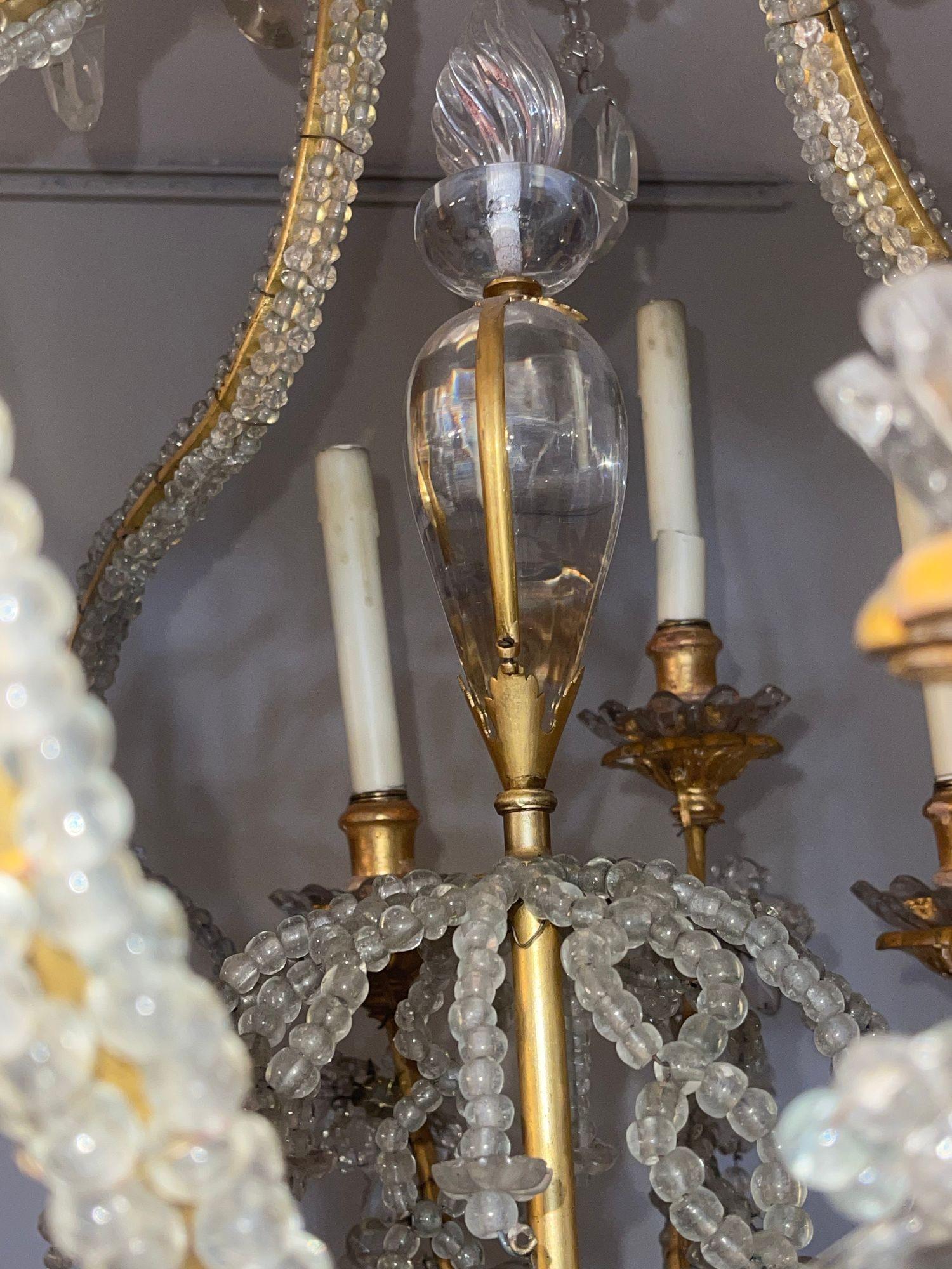 Cristallo Lampadario in cristallo e ferro dorato della Maison Baguès della metà del XX secolo in vendita