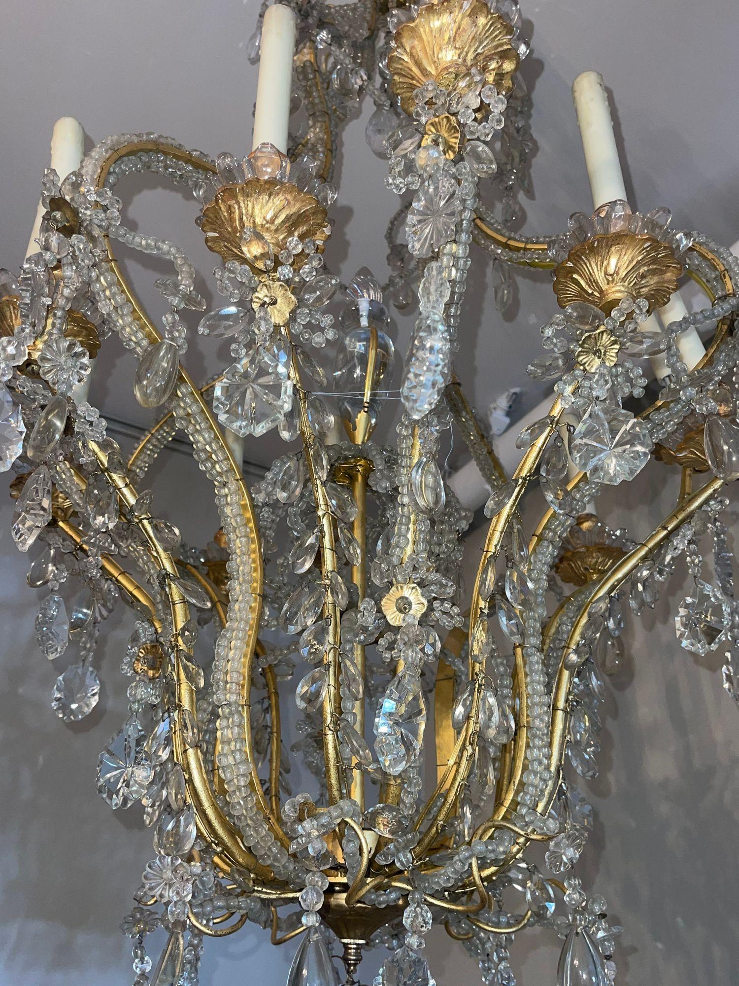Lampadario in cristallo e ferro dorato della Maison Baguès della metà del XX secolo in vendita 1