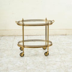 Chariot de bar en laiton et verre de la Maison Jansen, France, milieu du XXe siècle