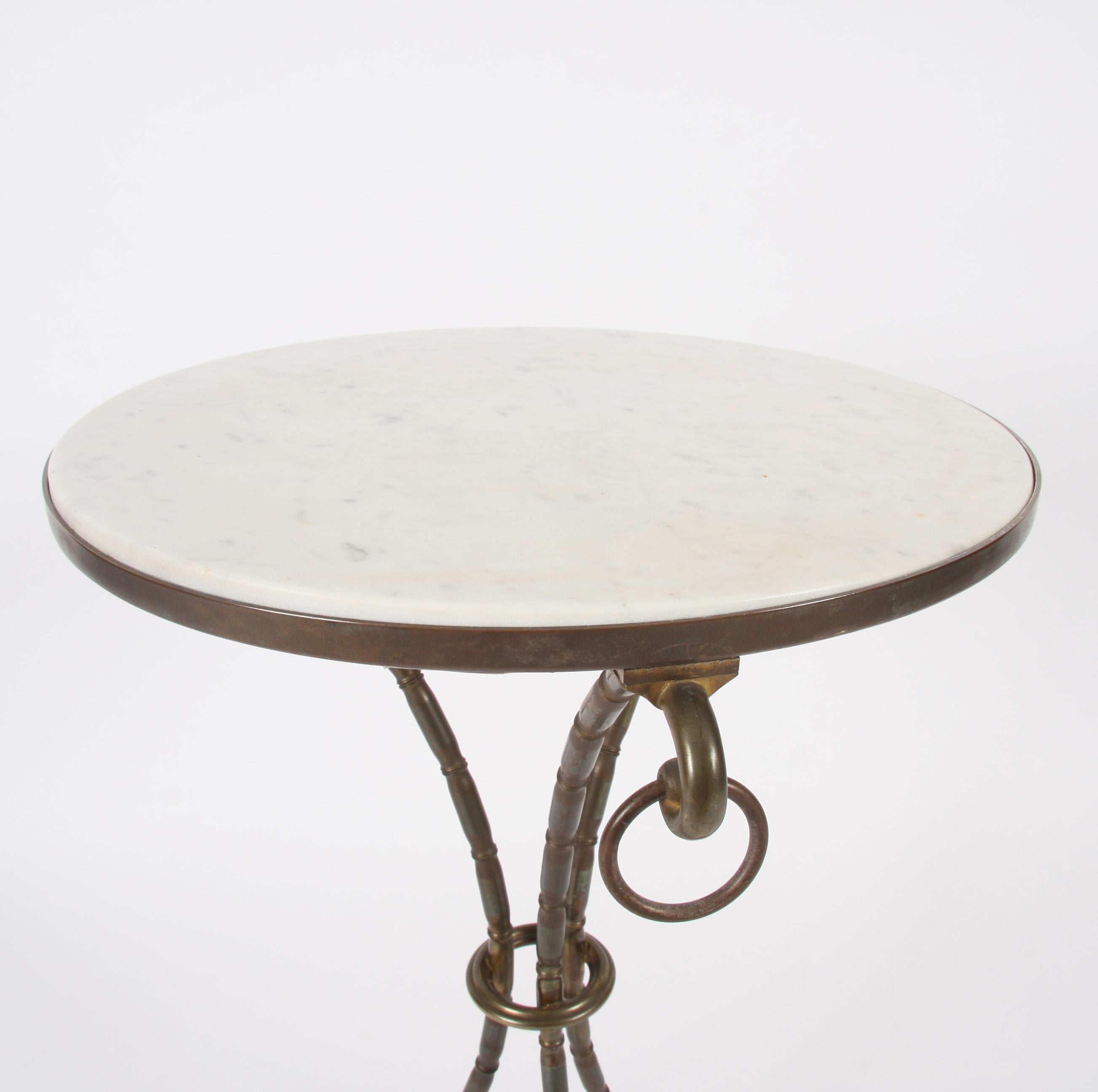This stunning steel and marble side table dates back to mid-20th century, France.