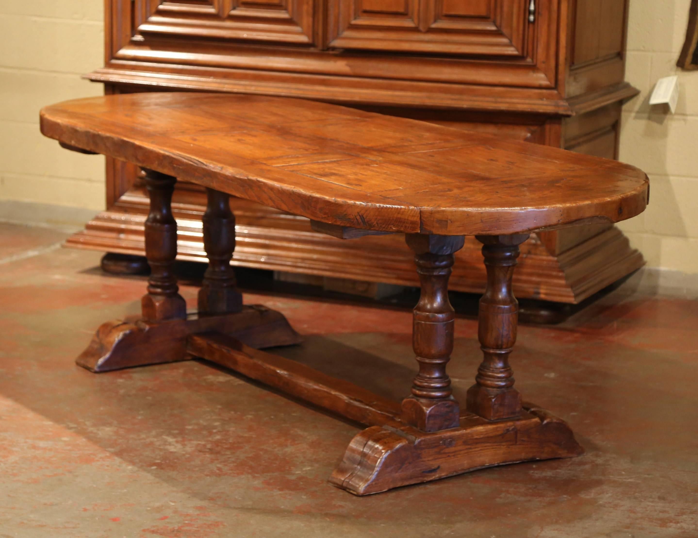 Hand-Carved Mid-20th Century French Oval Chestnut and Oak Rustic Trestle Farm Table