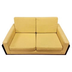 Mid-20th Century French Bouclé Sofa in dark wood, classic shape, timeless