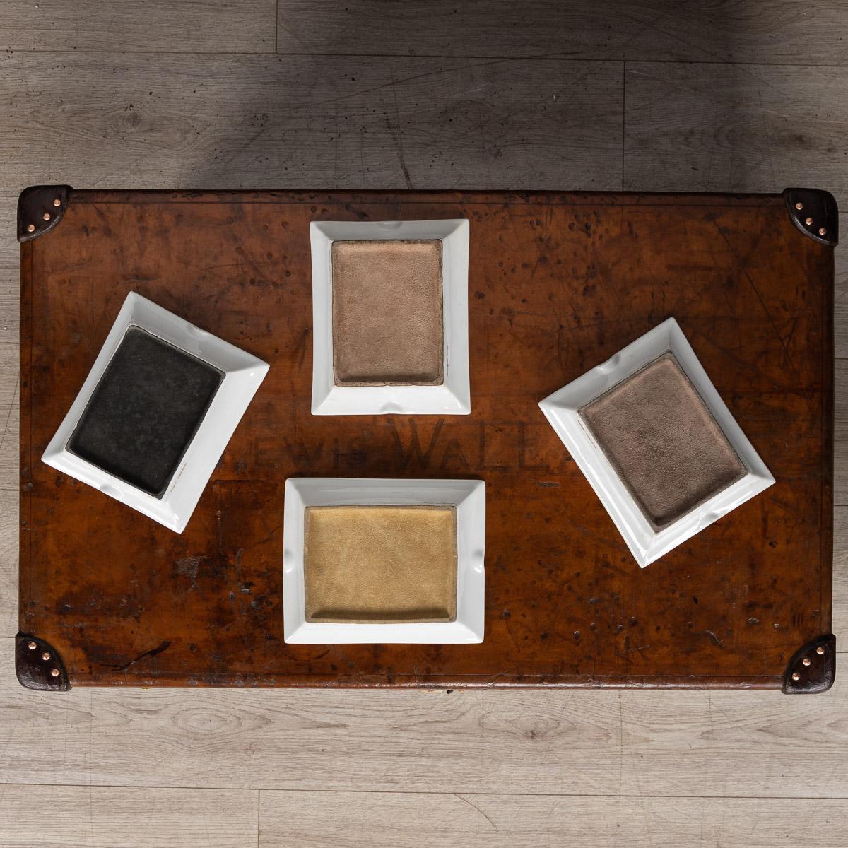 A set of four ceramic ashtrays by Hermès, made in France in the latter half of the 20th century. These ashtrays have always been very collectable with the vintage models in particular. This set of four has a lovely eclectic mix of scenes but at the
