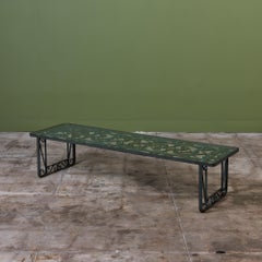 Tavolino in ferro battuto della metà del XX secolo con piano in vetro