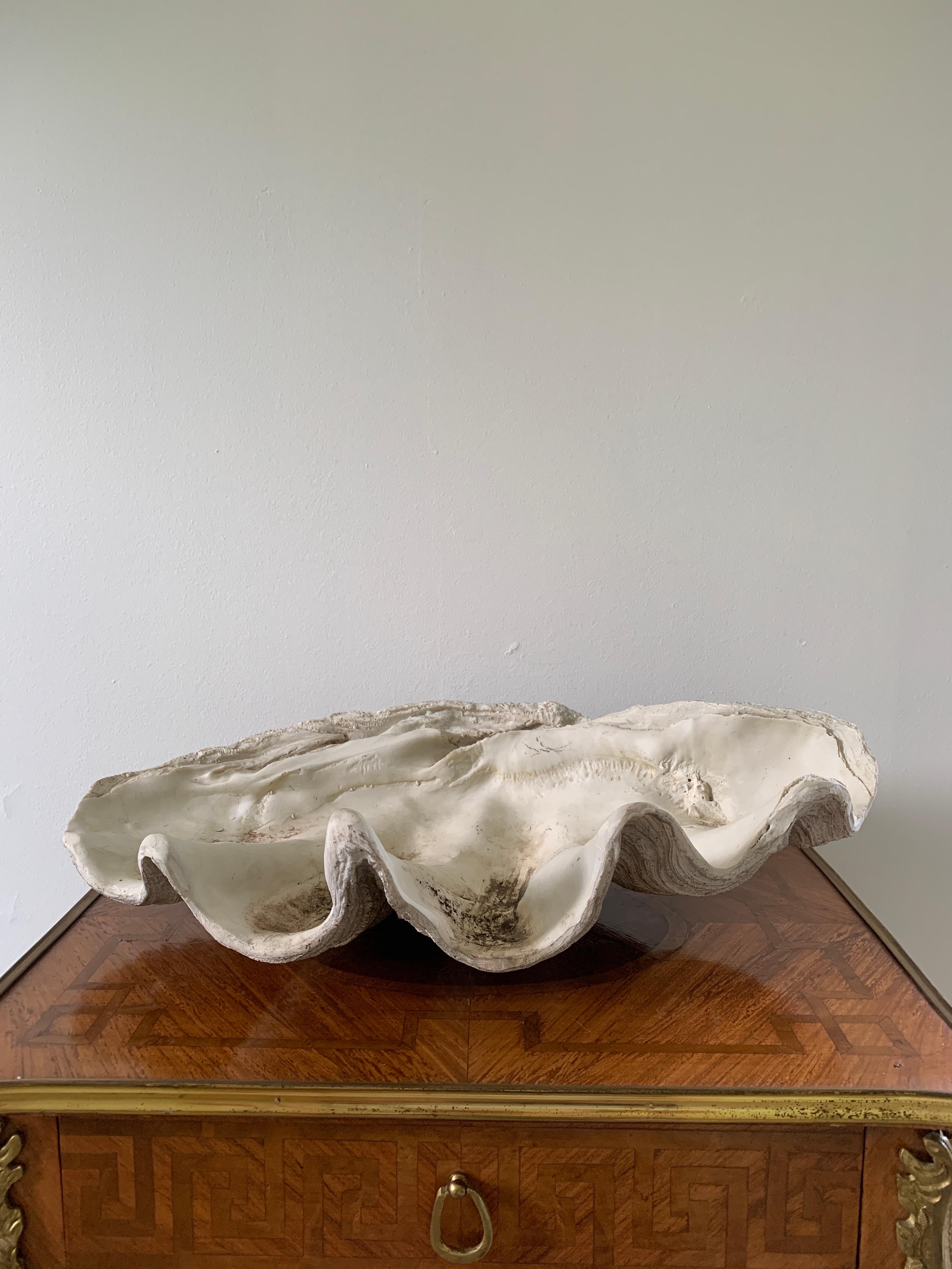 A large mid 20th century cast resin faux clam shell.
 