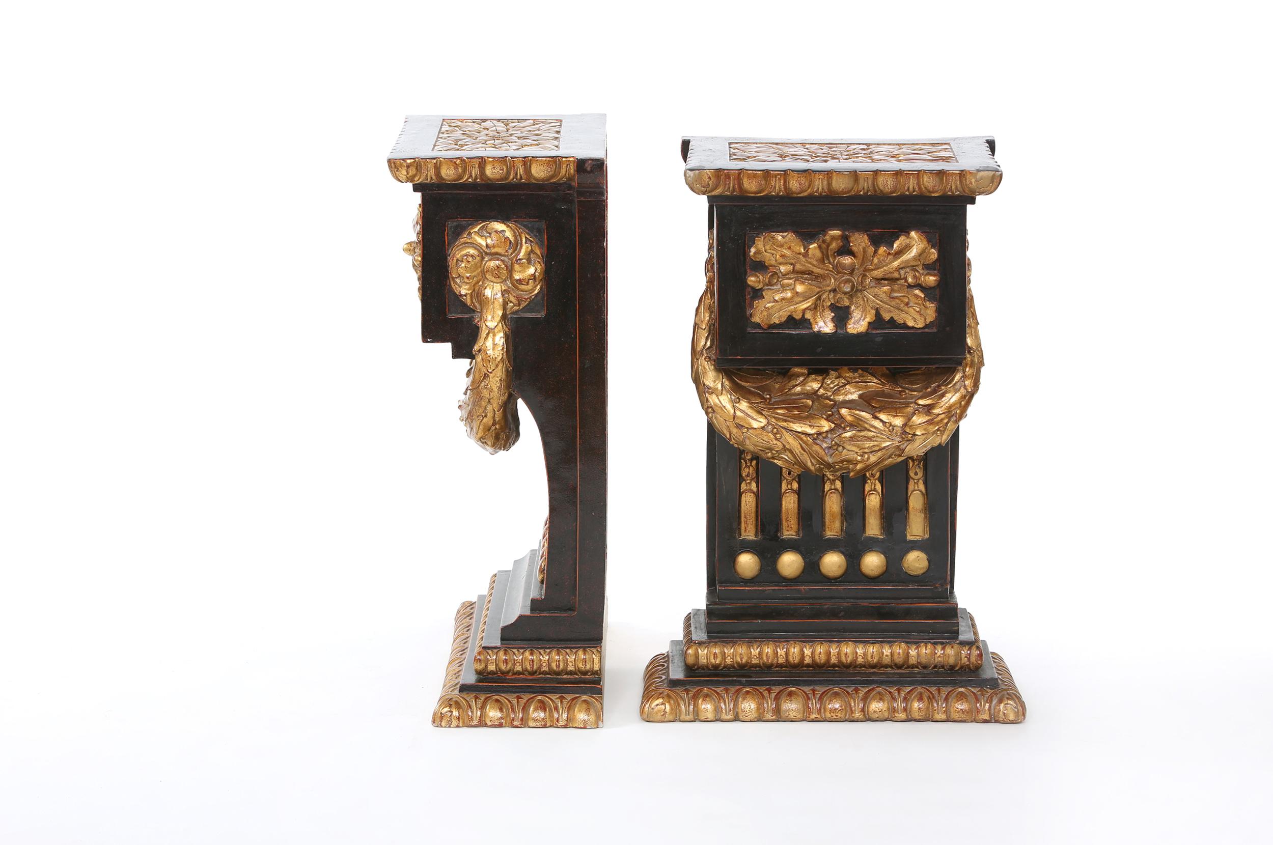 Mid-20th century pair of gilt gold and paint decorative bronze pedestal / side tables with exterior design details. Each table is in good condition. Minor wear consistent with age / use. Each table end / pedestal stand about 31 inches tall x 17.5