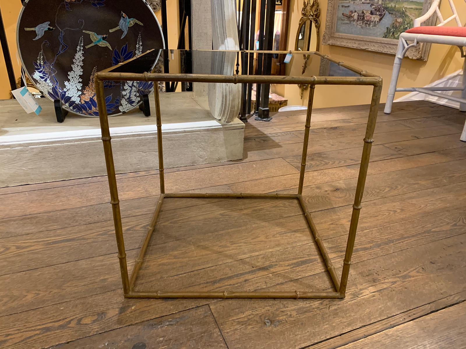 Mid-20th century gilt metal faux bamboo square table, black glass top.