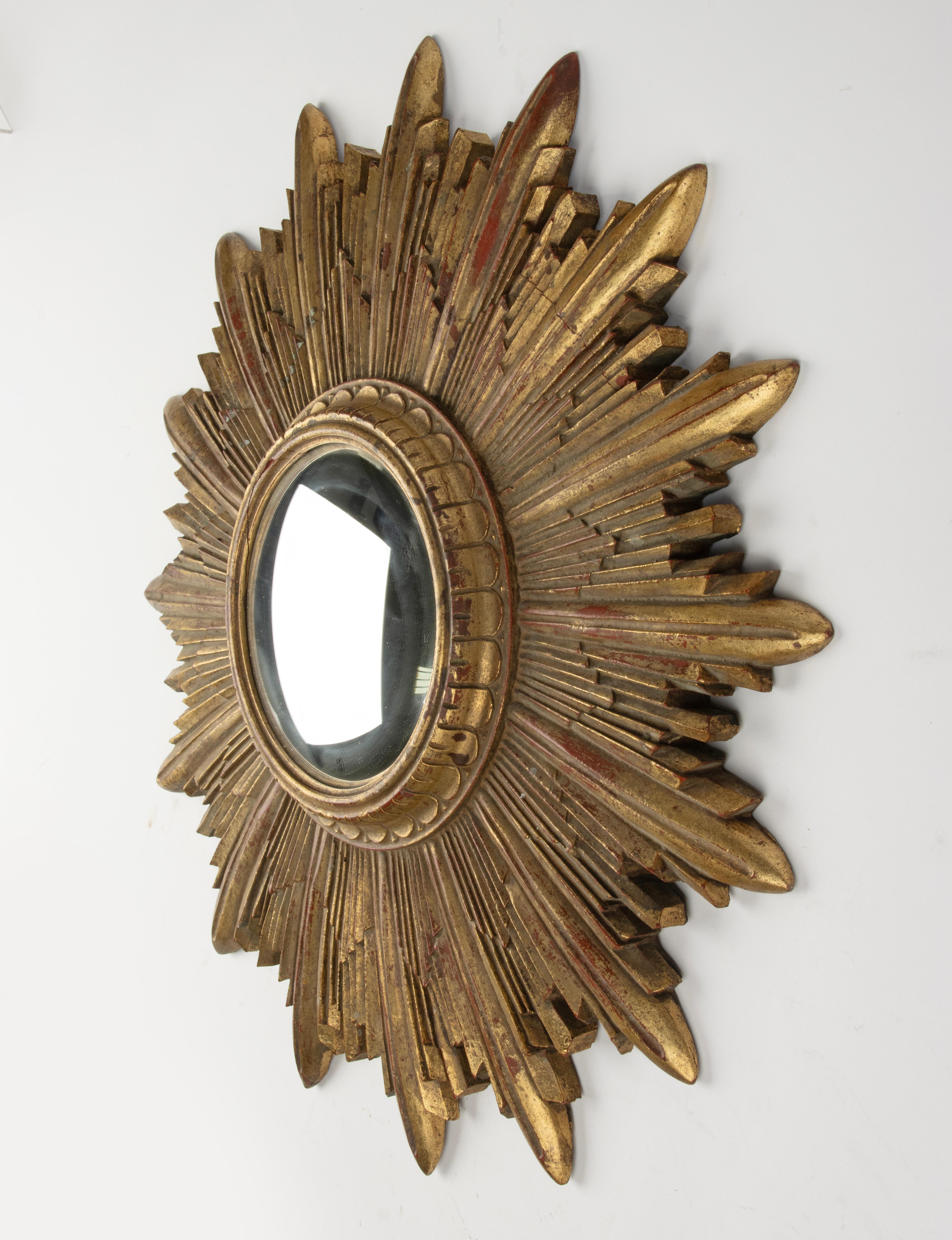 Hand-Crafted Mid 20th Century Gilt Resin Convex Sunburst mirror For Sale