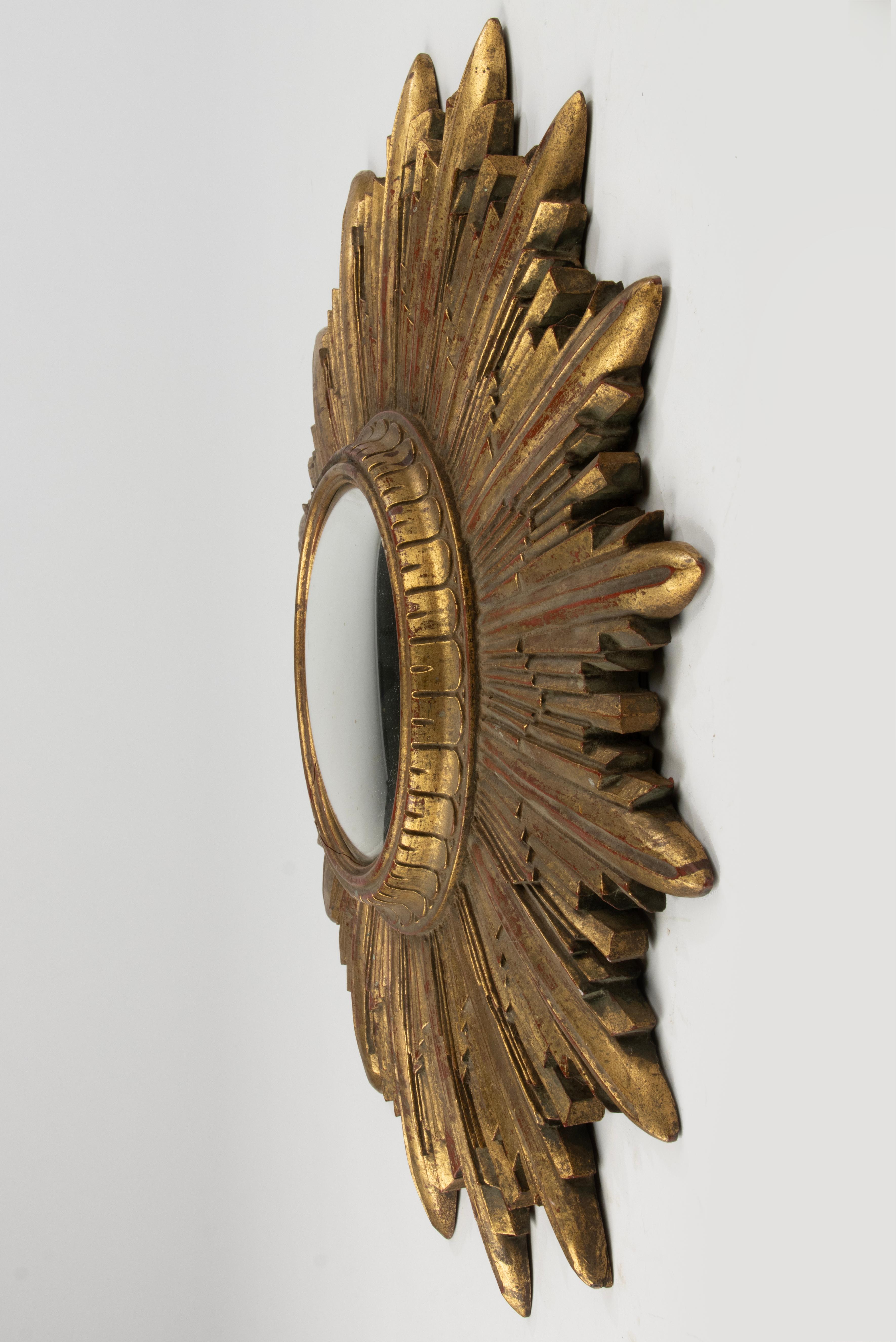 Mid-20th Century Mid 20th Century Gilt Resin Convex Sunburst mirror For Sale