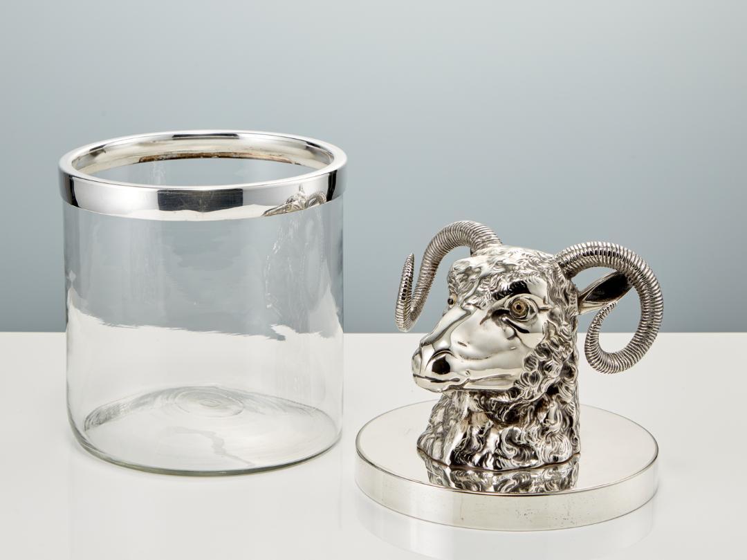 An exquisite vintage barware piece originating from Austria, circa 1960.

The glass body exudes a sense of refinement and elegance, while the silver-plated lid adds a touch of opulence, ensuring a barware item of unparalleled quality and