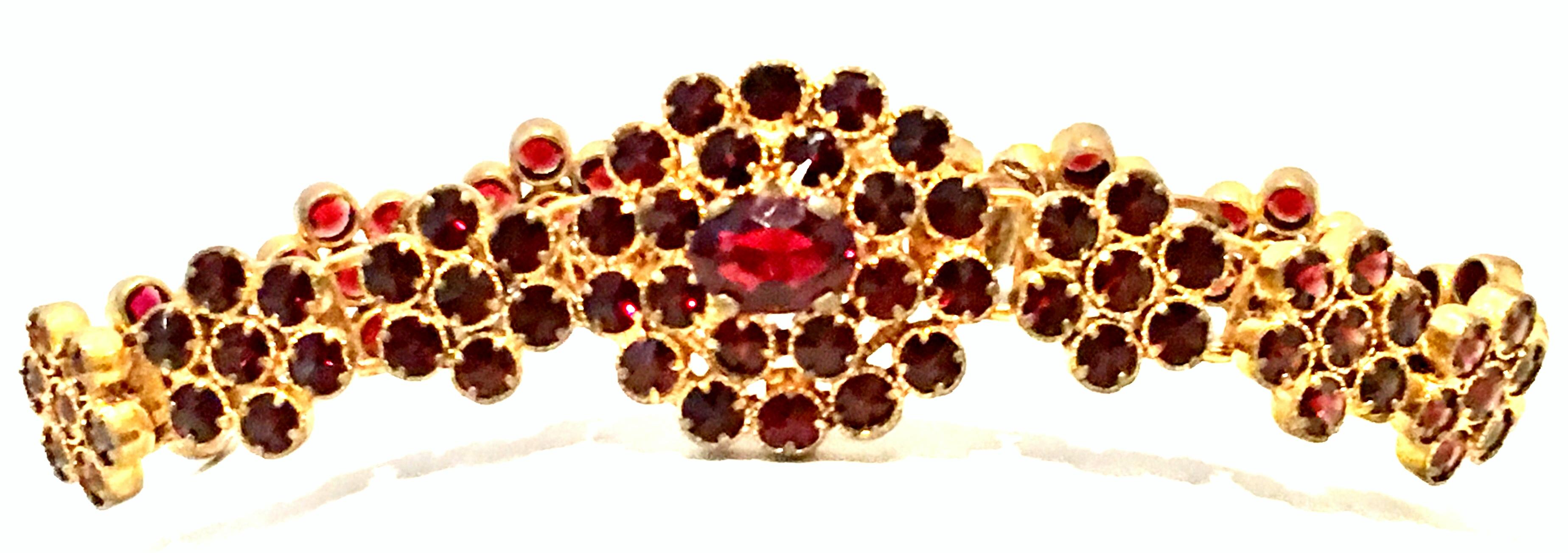 Mid-20th Century Gold Plate & Natural Rose Cut Garnet Link Bracelet . This stunning and finely crafted rose cut authentic garnet and gold plate prong set bracelet features a large central abstract floral ornament with twelve abstract floral links